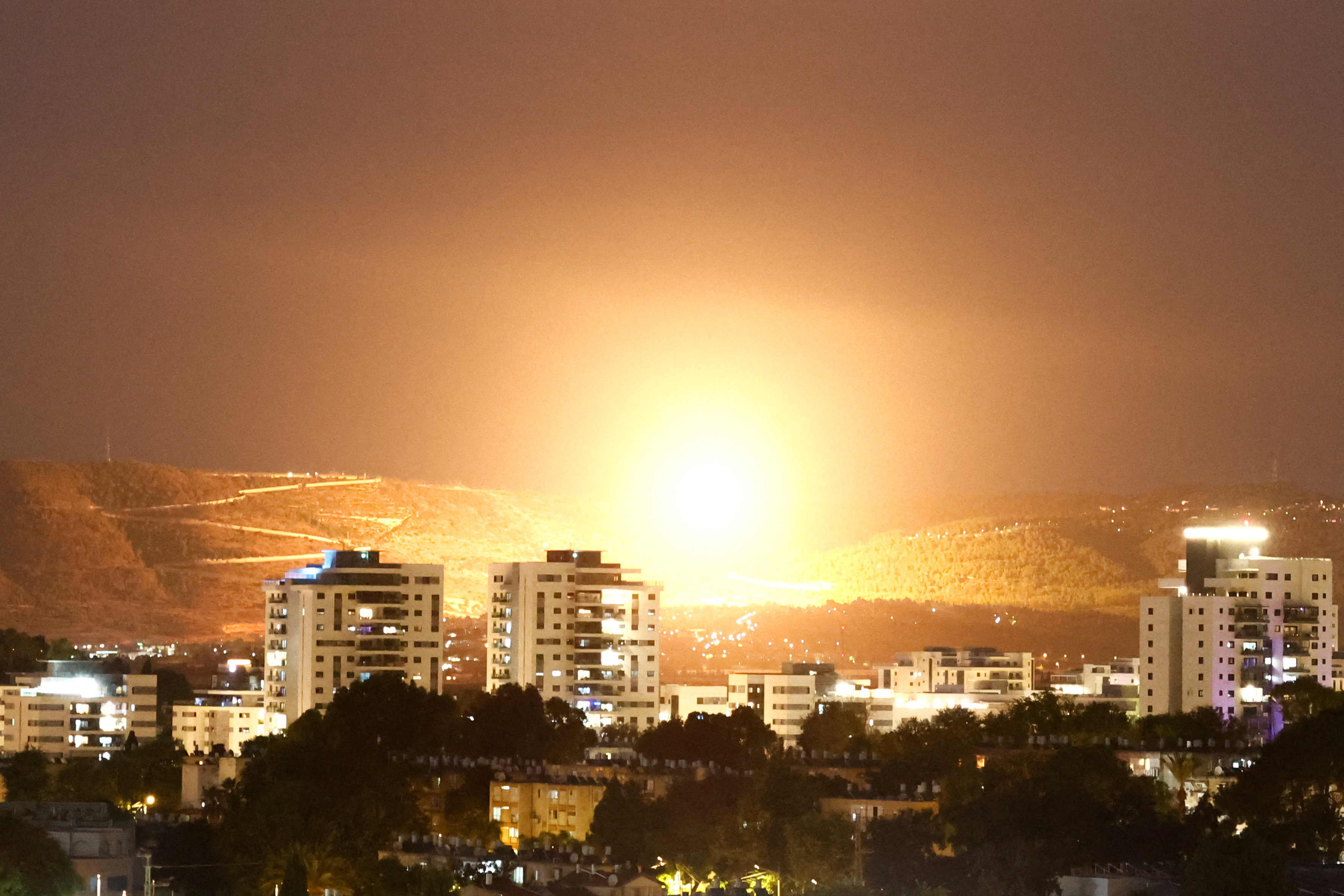 An explosion is seen following a missile alert amid cross-border hostilities between Hezbollah and Israel, as seen from as seen from Nahariya, northern Israel