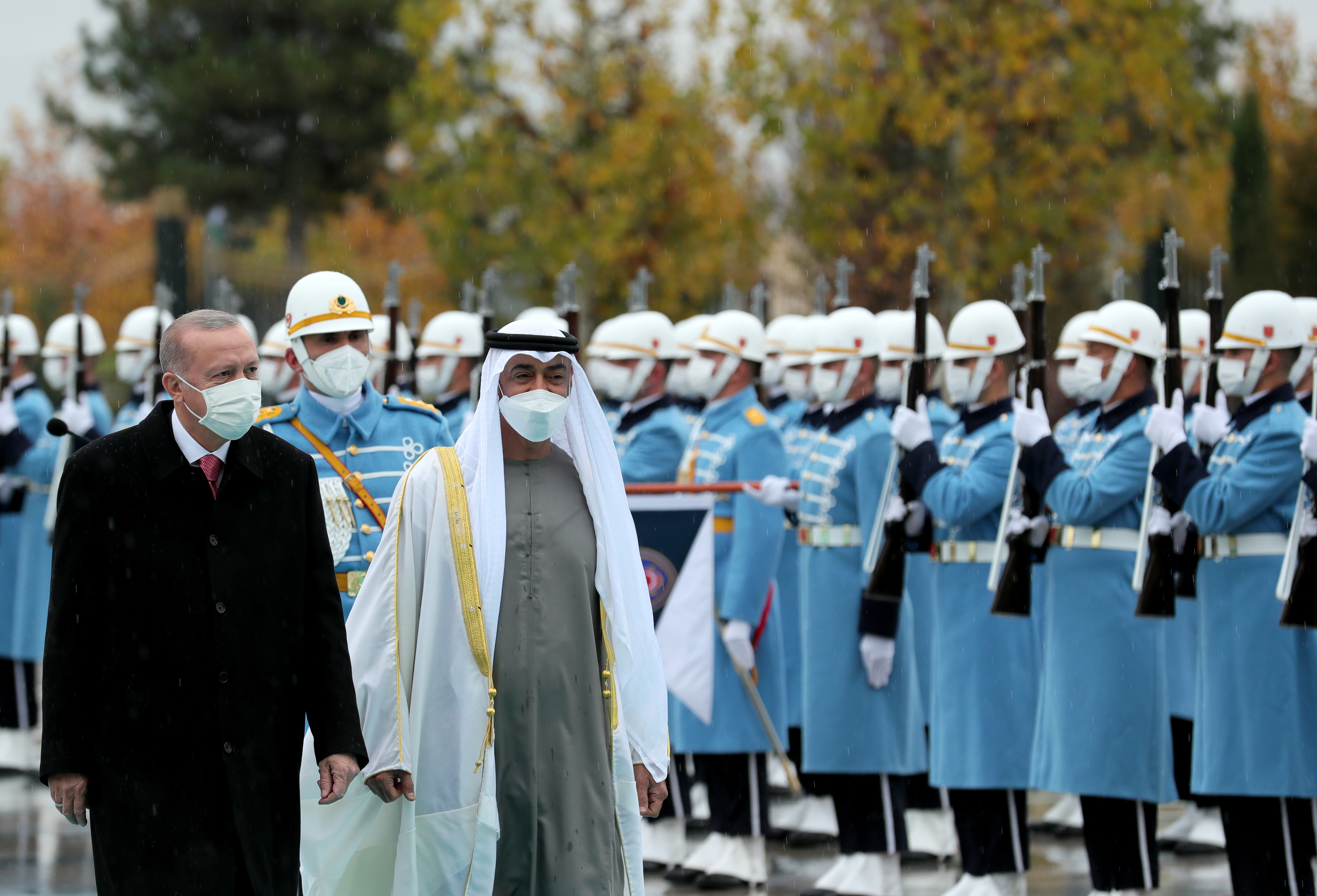 Turkish President Tayyip Erdogan and Abu Dhabi Crown Prince Sheikh Mohammed bin Zayed al-Nahyan review a guard of honour, in Ankara