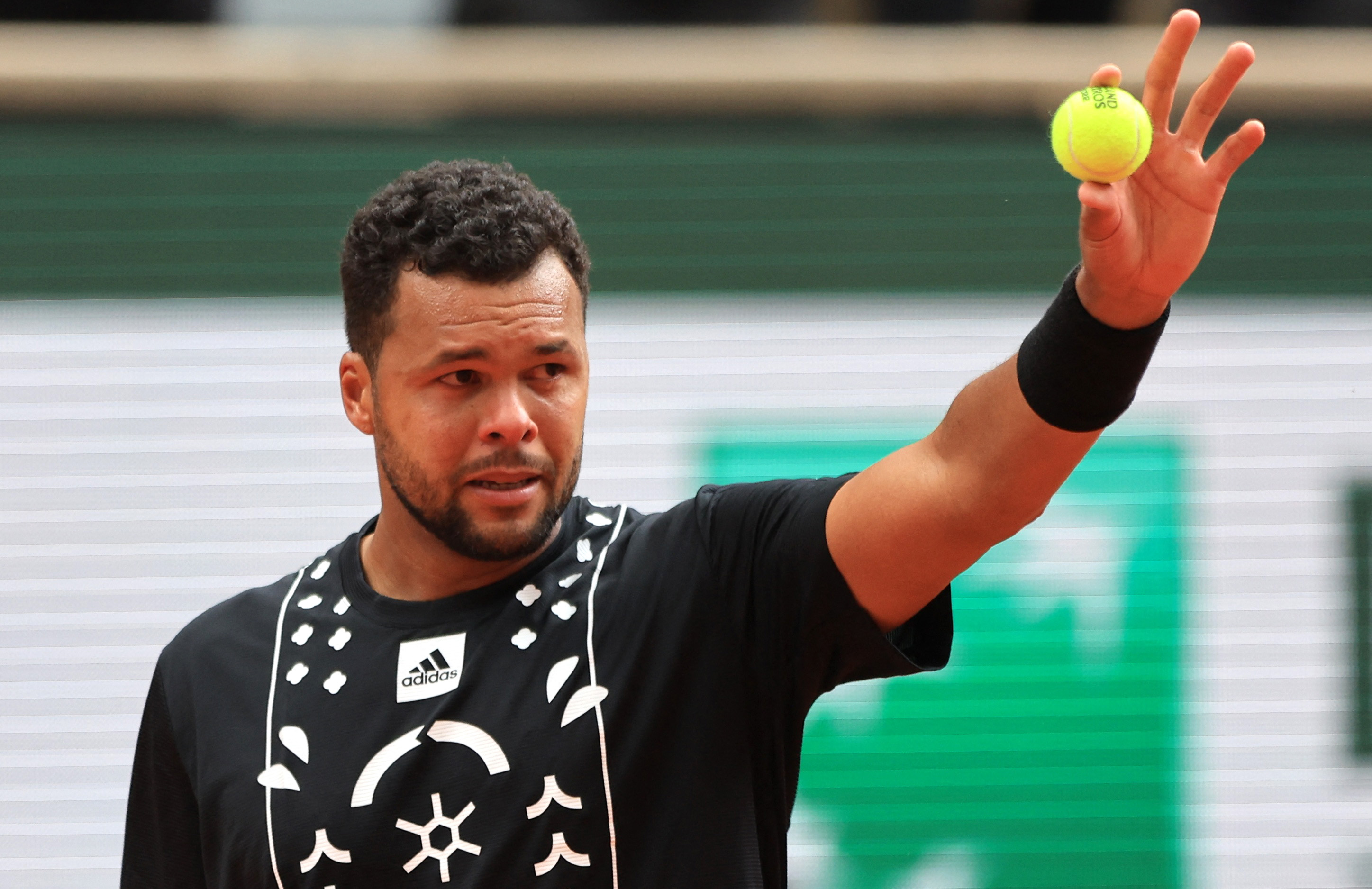 Simon draws inspiration from Tsonga in gruelling French Open win | Reuters