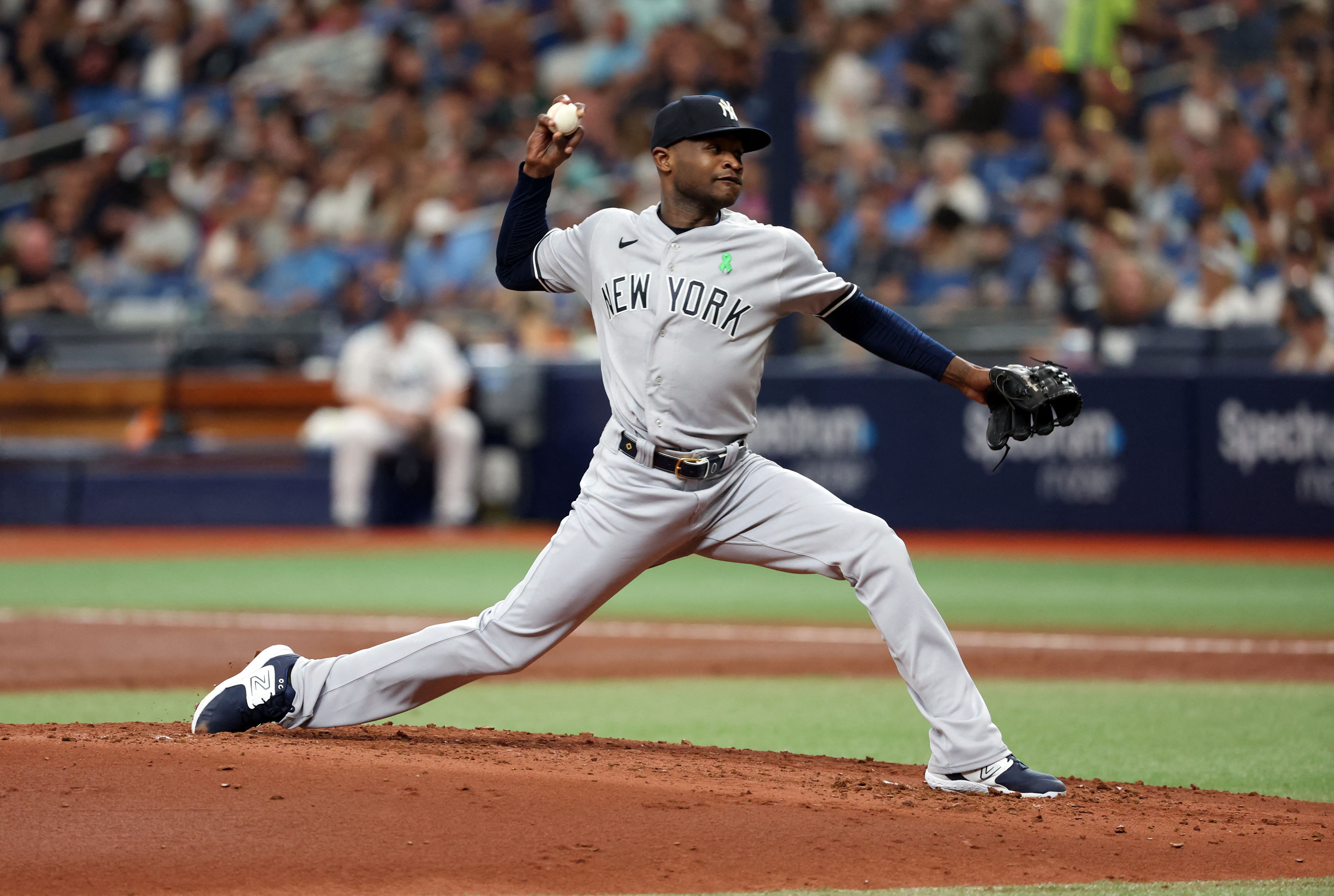 Yankees score 3 runs in 8th inning to end Rays' win streak