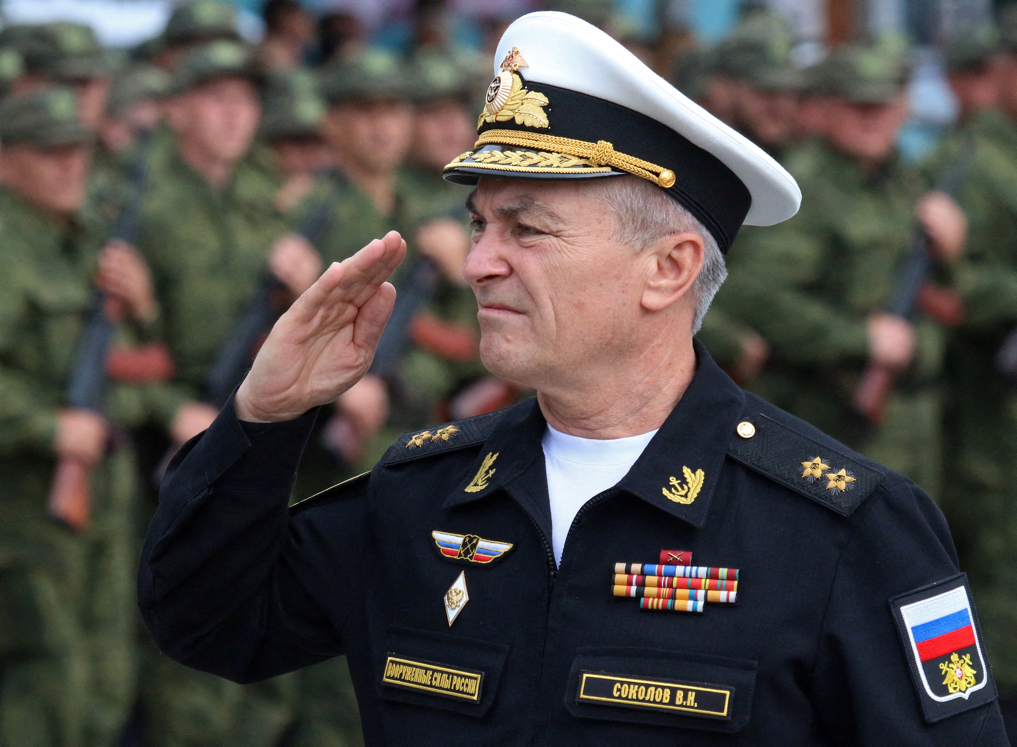 Commander of the Russian Black Sea Fleet Vice-Admiral Viktor Sokolov salutes during a ceremony in Sevastopol