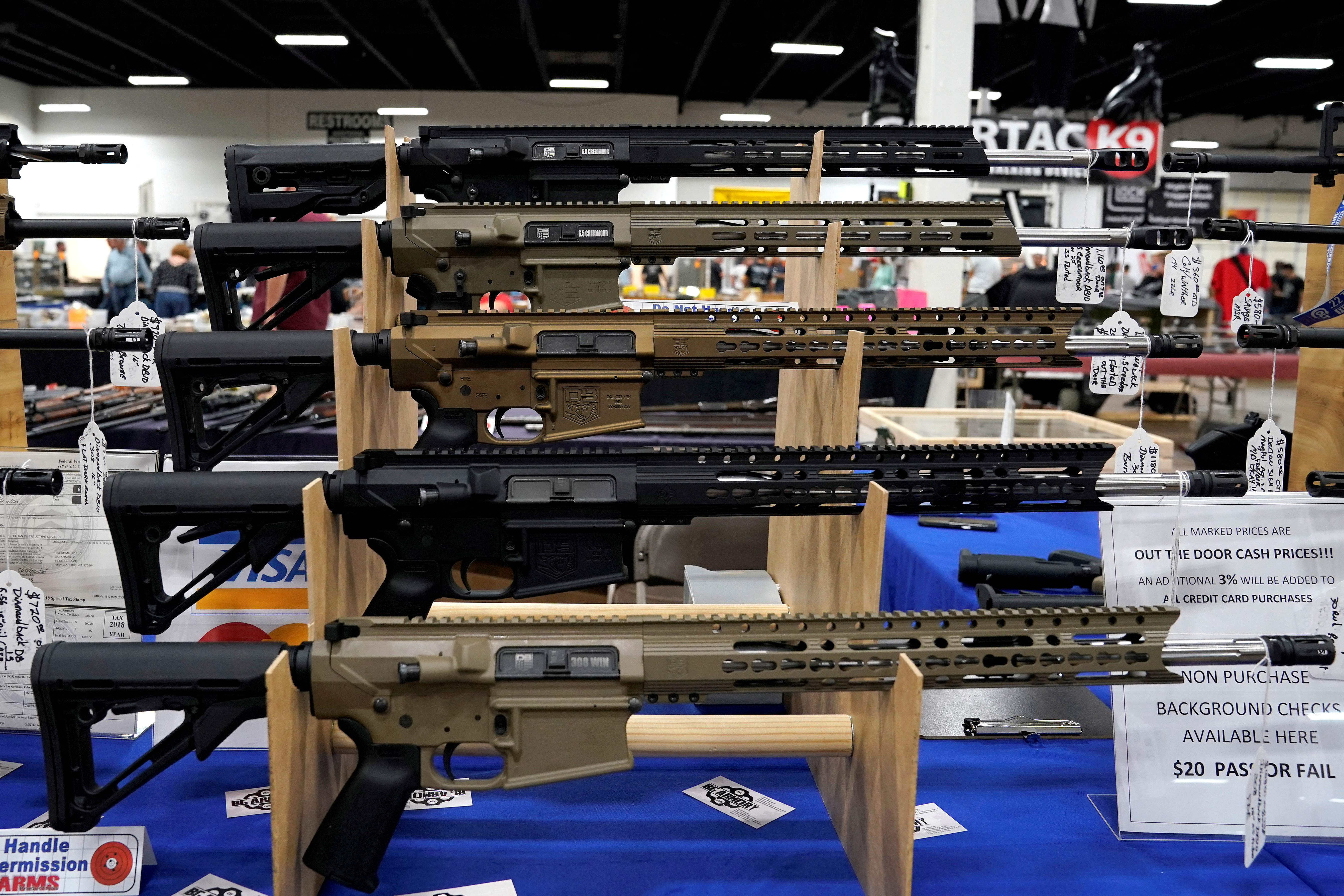 AR-15 rifles are displayed for sale at the Guntoberfest gun show in Oaks, Pennsylvania