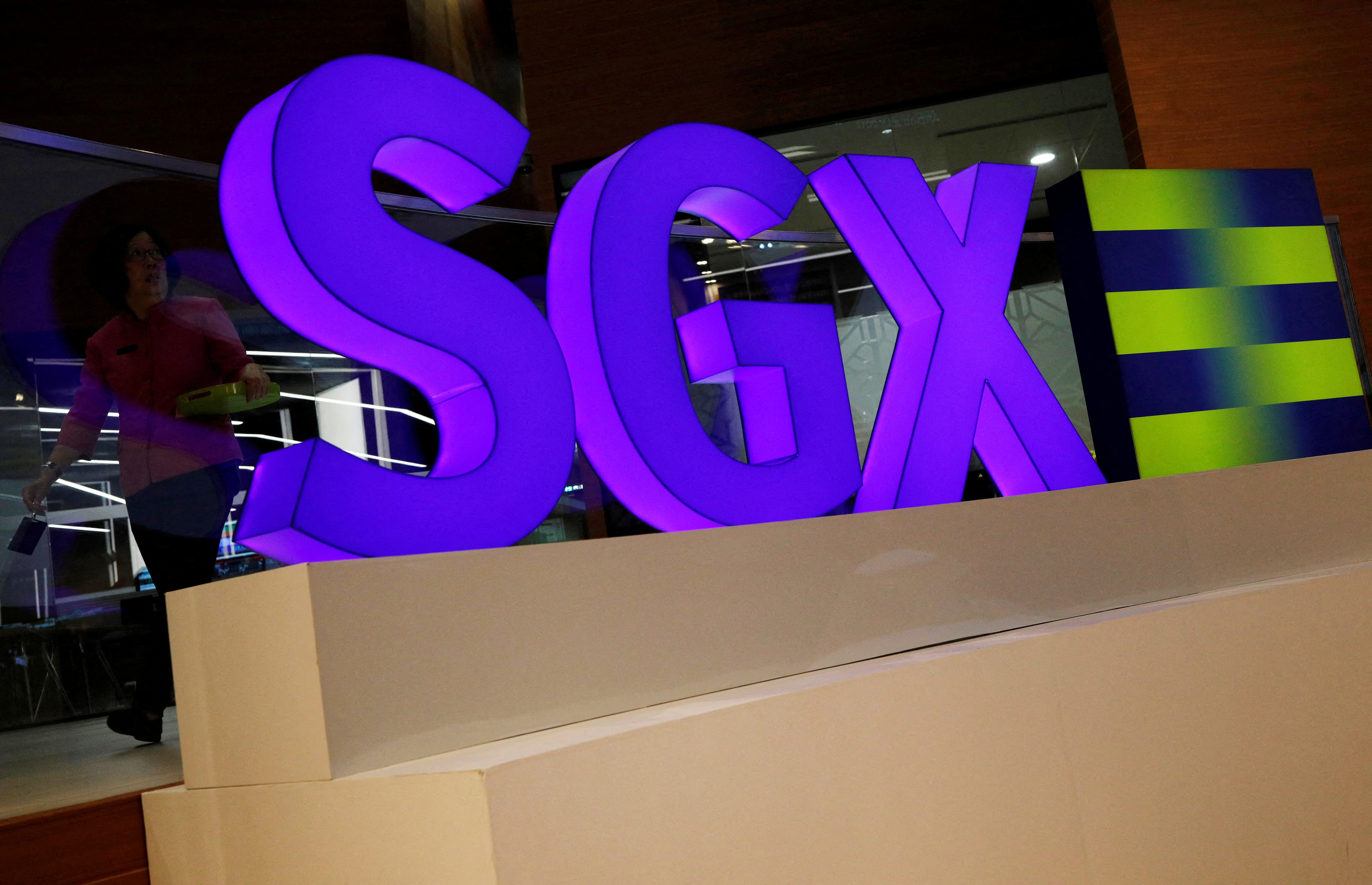 An SGX sign is pictured at Singapore Stock Exchange July 19, 2017. REUTERS/Edgar Su