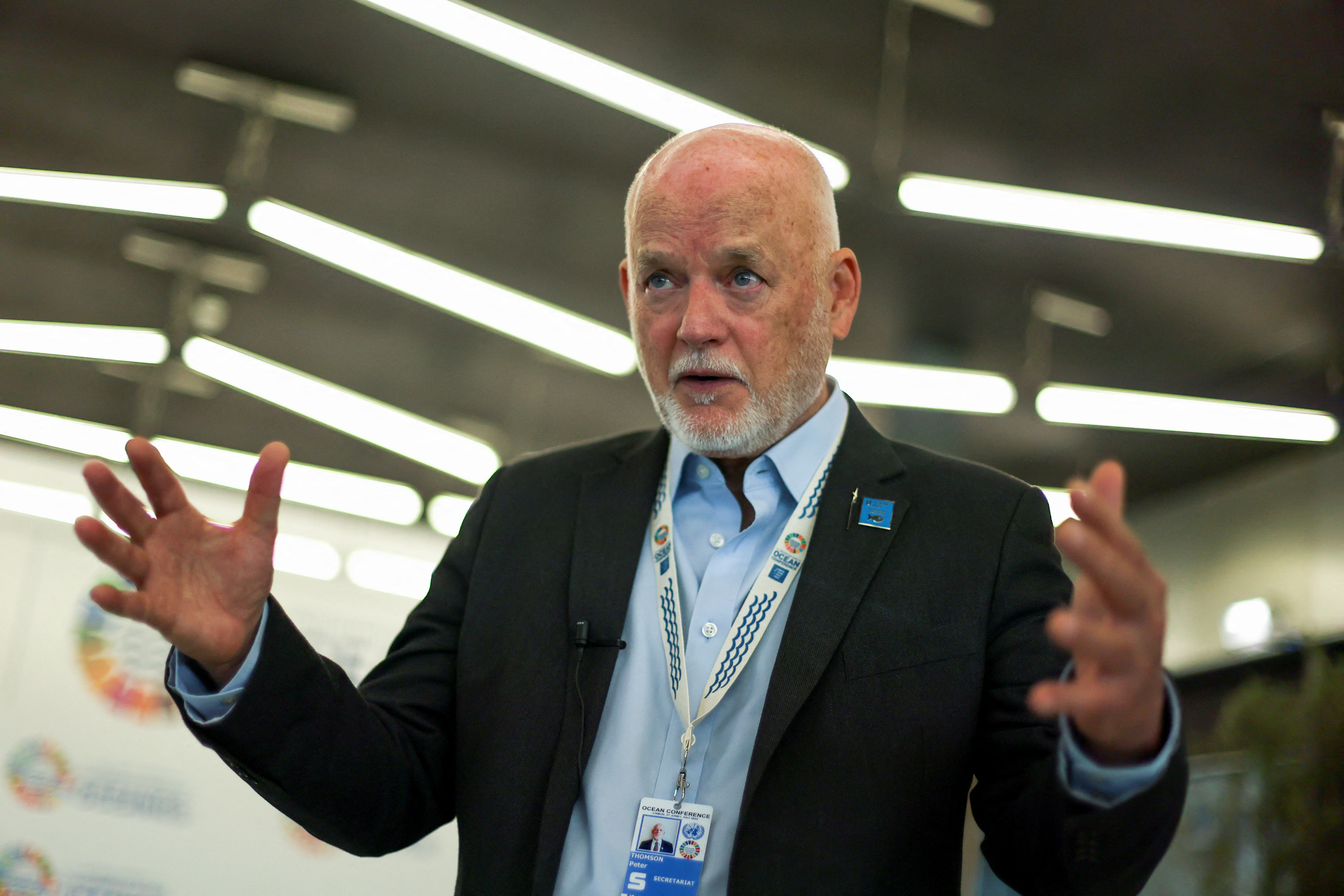 UN Special Envoy for the Ocean, Peter Thomson, gestures during an interview ahead of the 2022 Ocean Conference in Lisbon