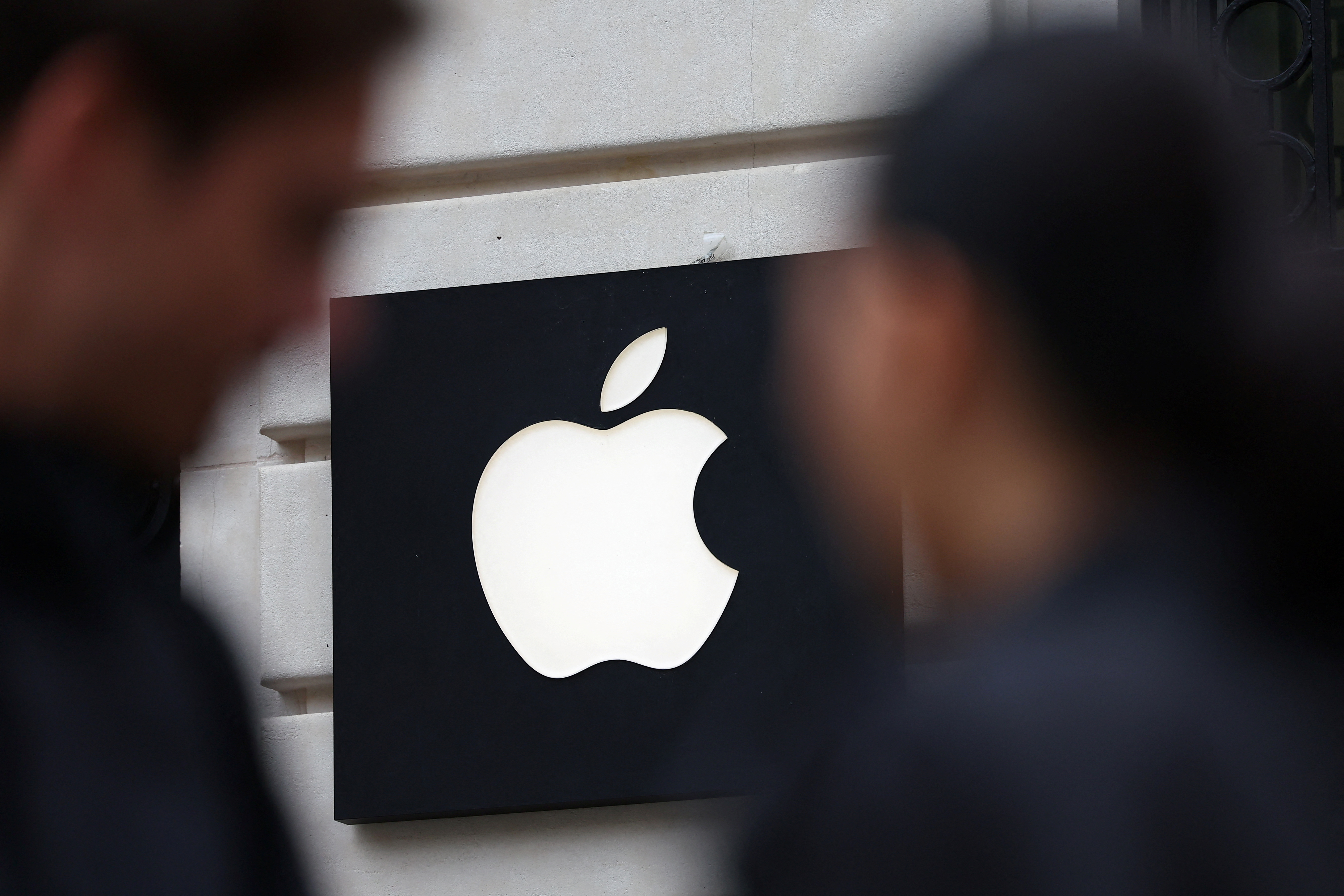 Italy regulator fines Apple $115 mln for alleged anti-trust violations  through app | Reuters