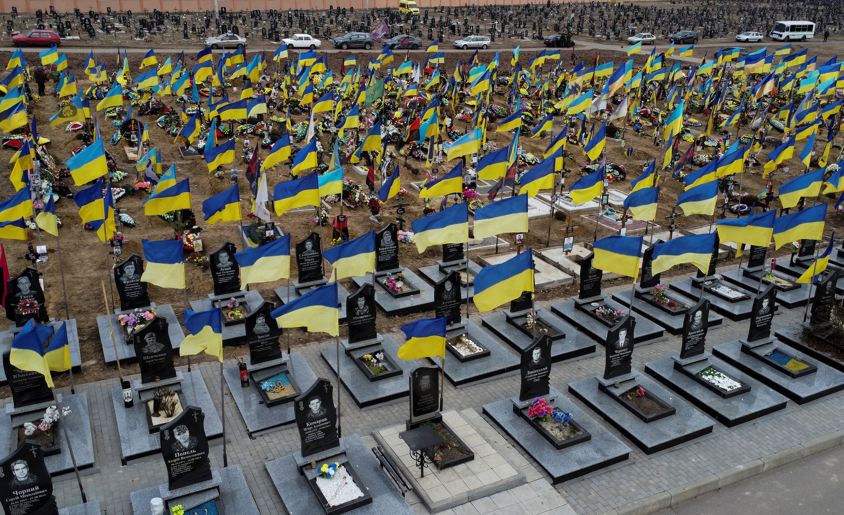 View shows graves of killed Ukrainian defenders at a cemetery in Kharkiv
