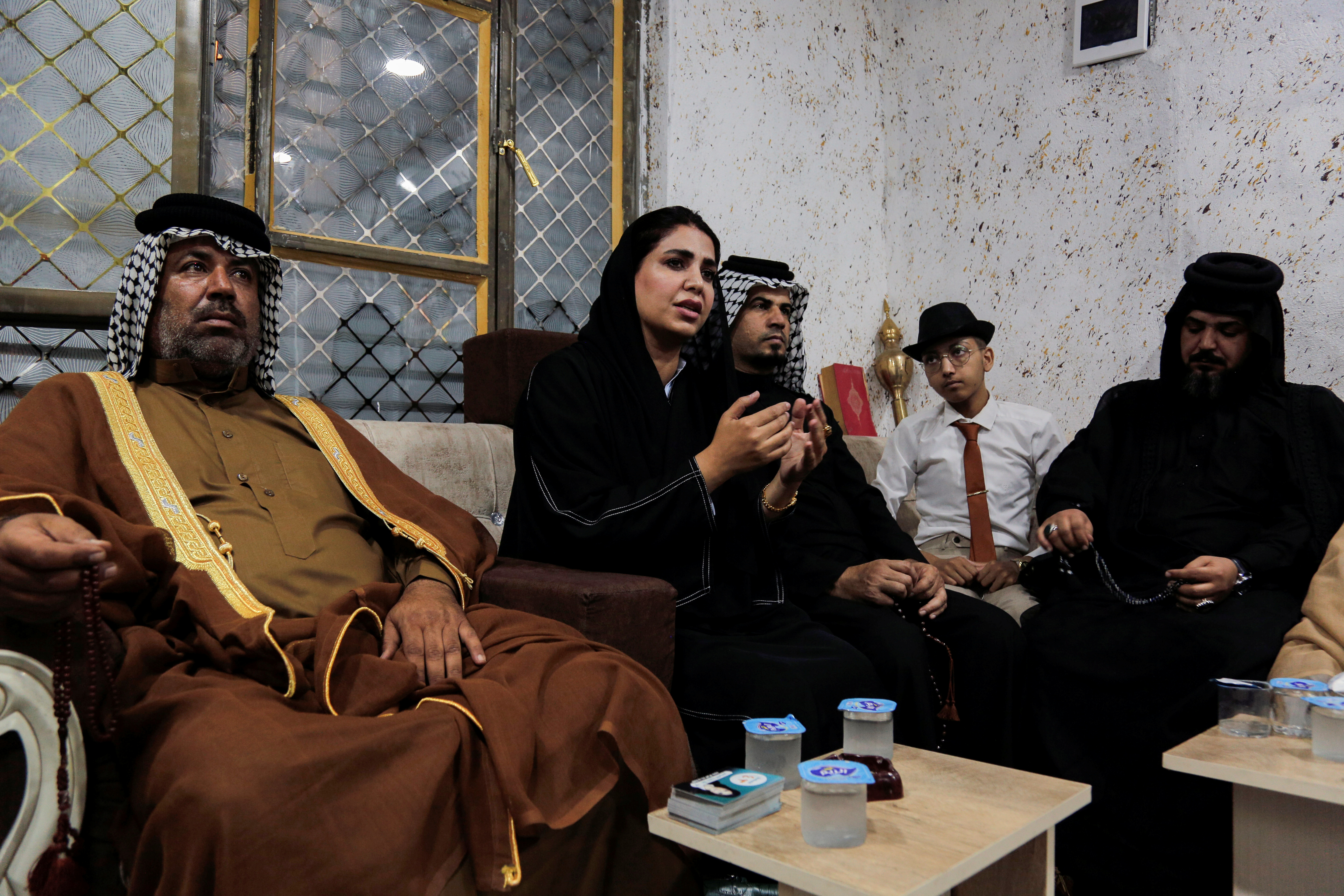 Ola al-Tamimi, a candidate in Iraq's upcoming parliamentary elections, speaks to her supporters in Baghdad