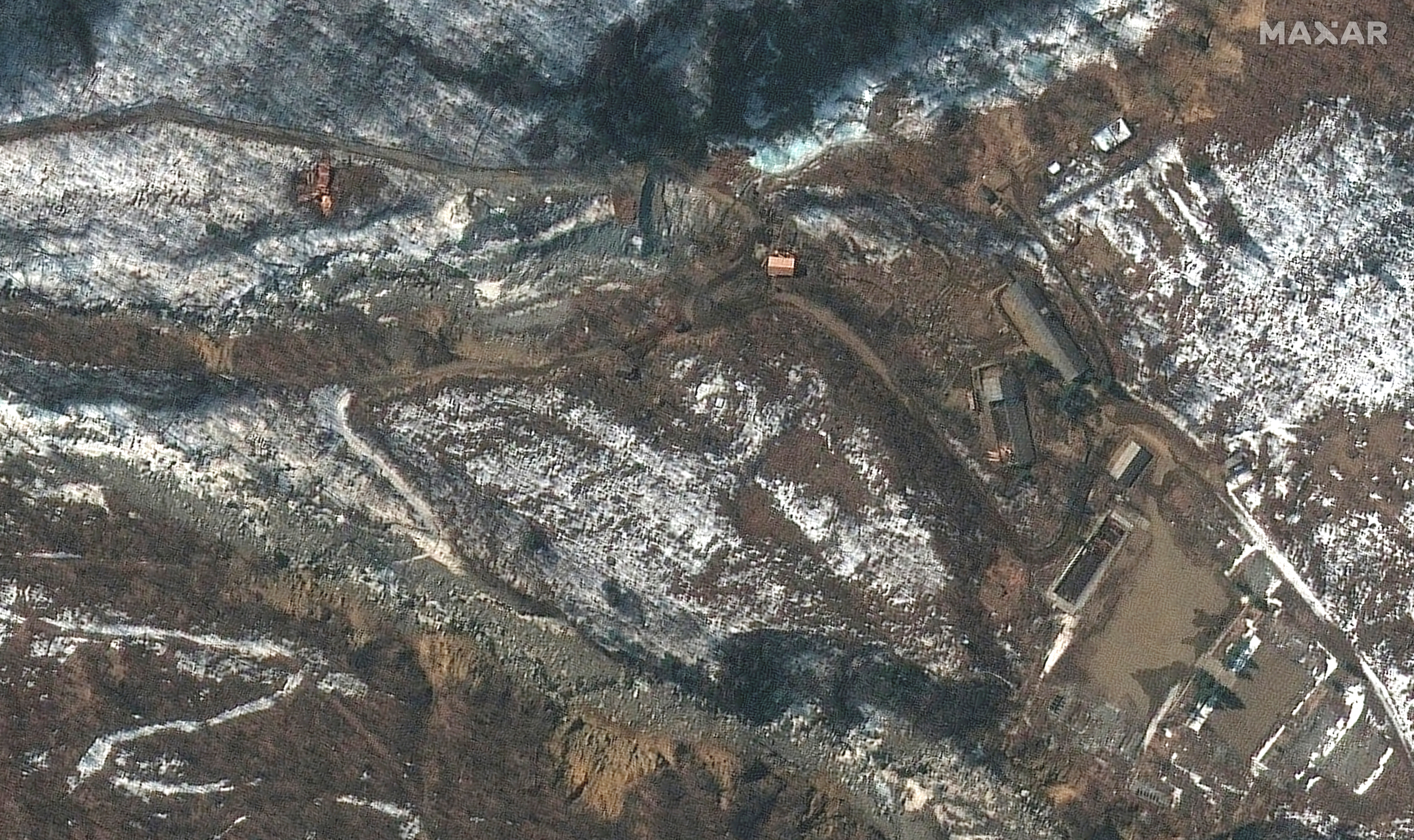 A satellite image shows an overview of new activity at the Punggye-ri nuclear test site, Kilju County