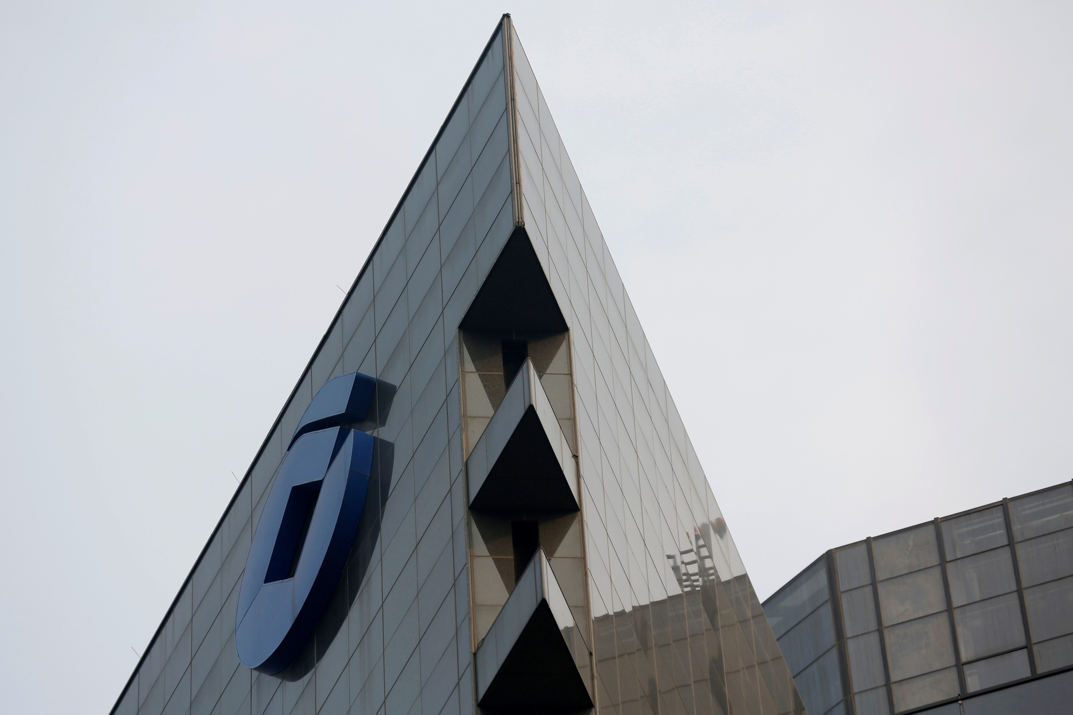 China Construction Bank Corp logo is seen on its headquarters in Beijing