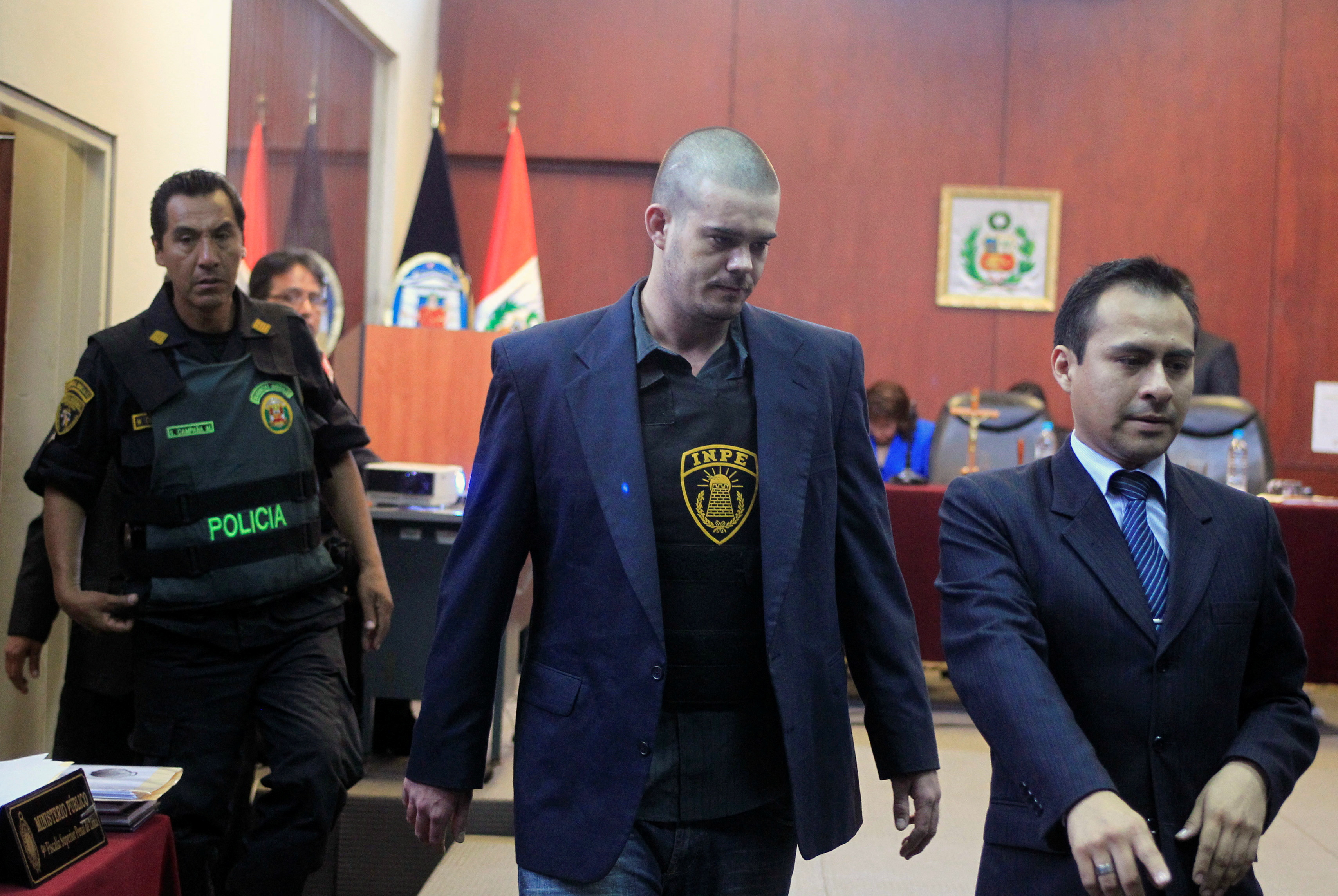 Dutch citizen Van der Sloot enters the courtroom at the Lurigancho prison in Lima