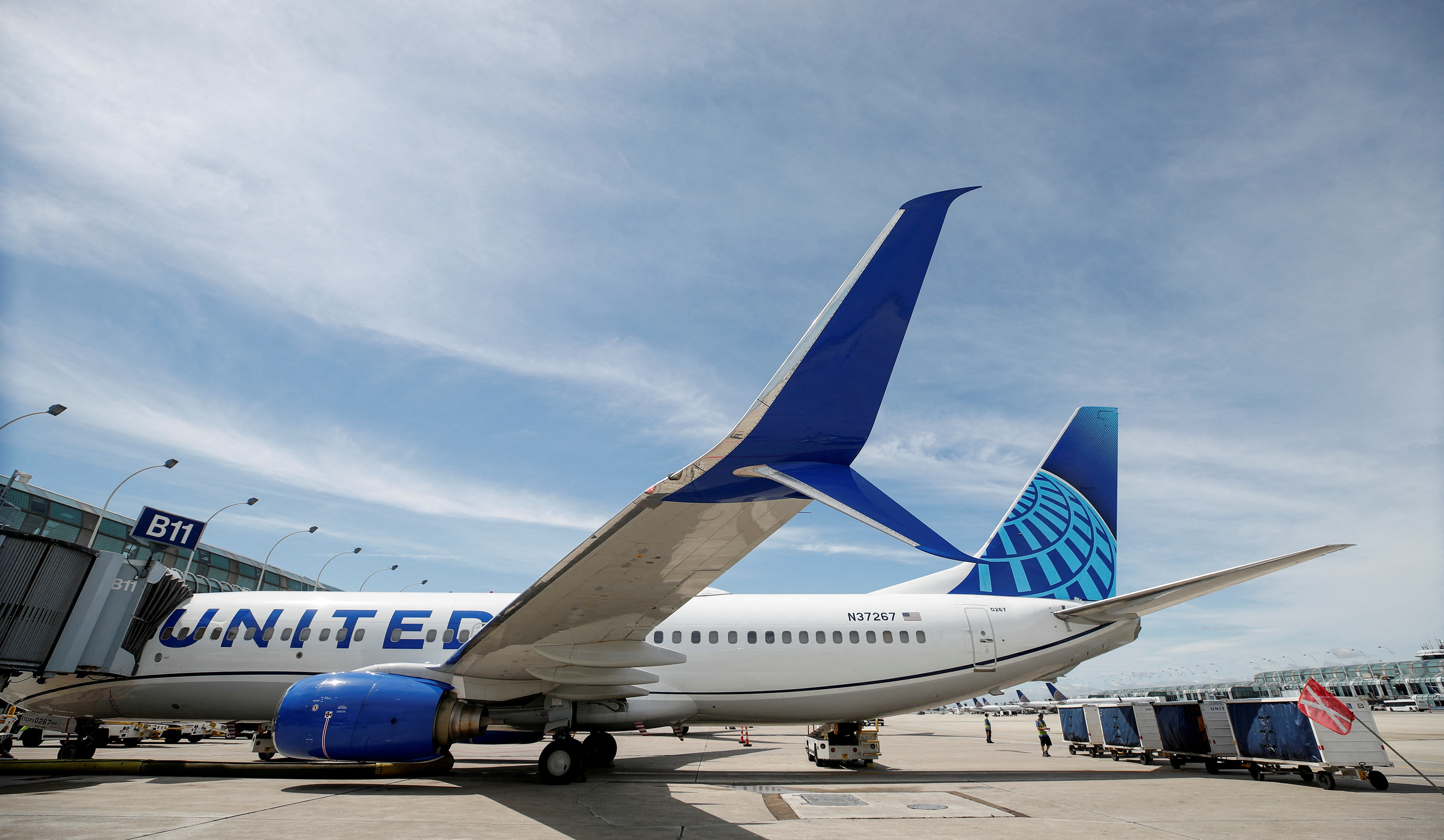 United Airlines first new livery Boeing 737-800 sits at a gate O'Hare International Airport in Chicago