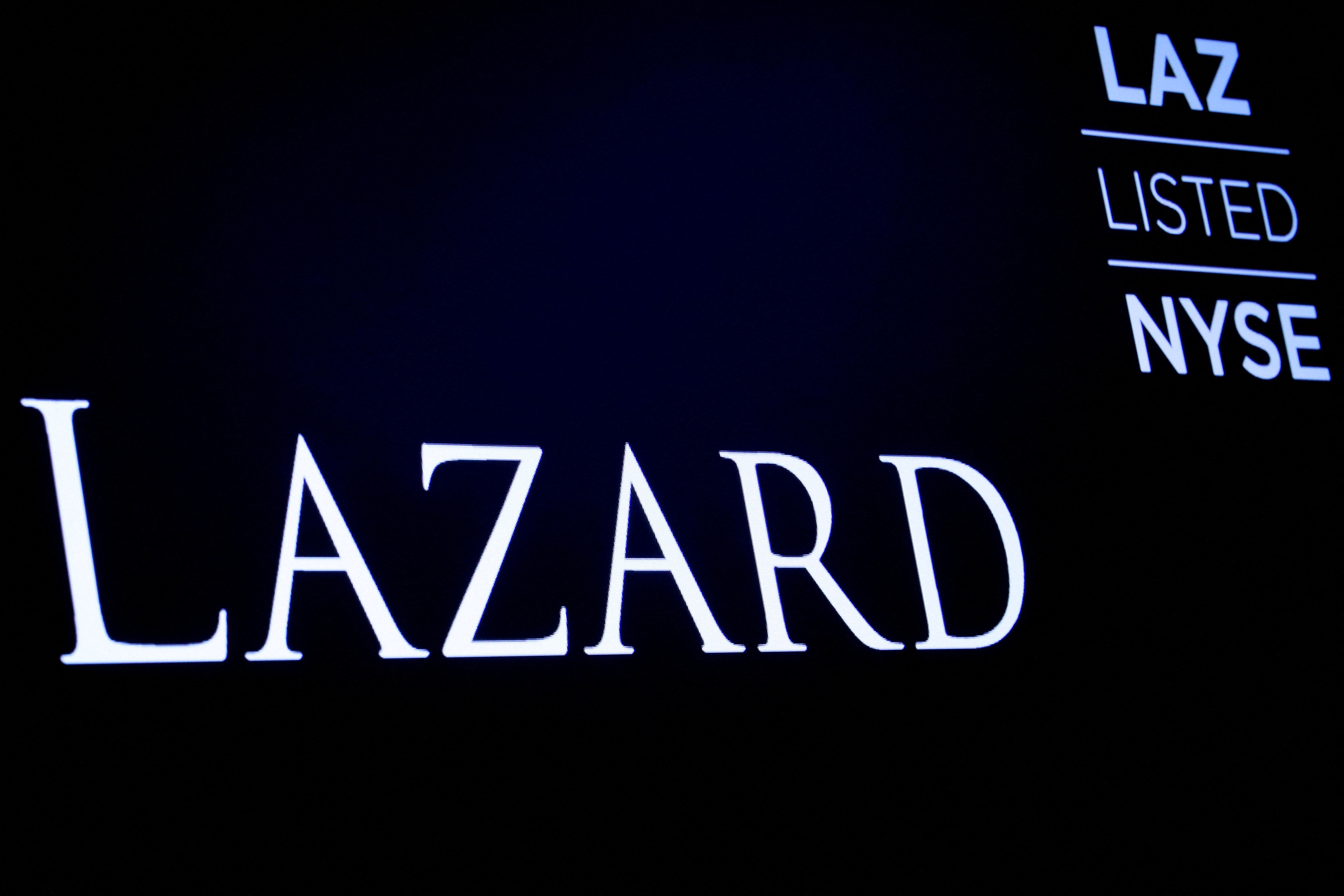 FILE PHOTO: The logo and trading information for Lazard Ltd appear on a screen on the floor at theNYSE in New York