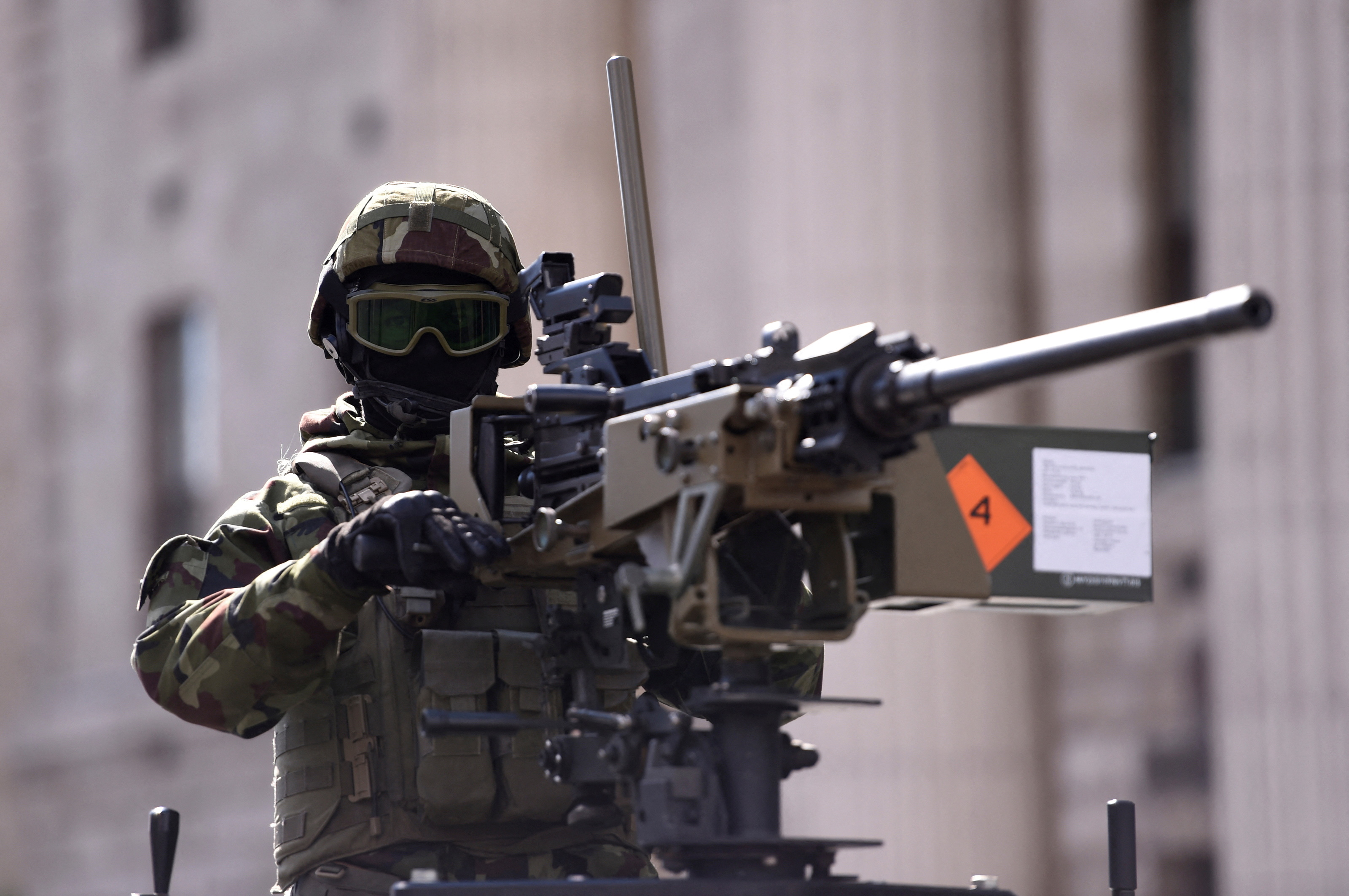 A member of the Irish Defence Force with a machine gun takes part in a parade during the commemoration of the 100 year anniversary of the Irish Easter Rising in Dublin