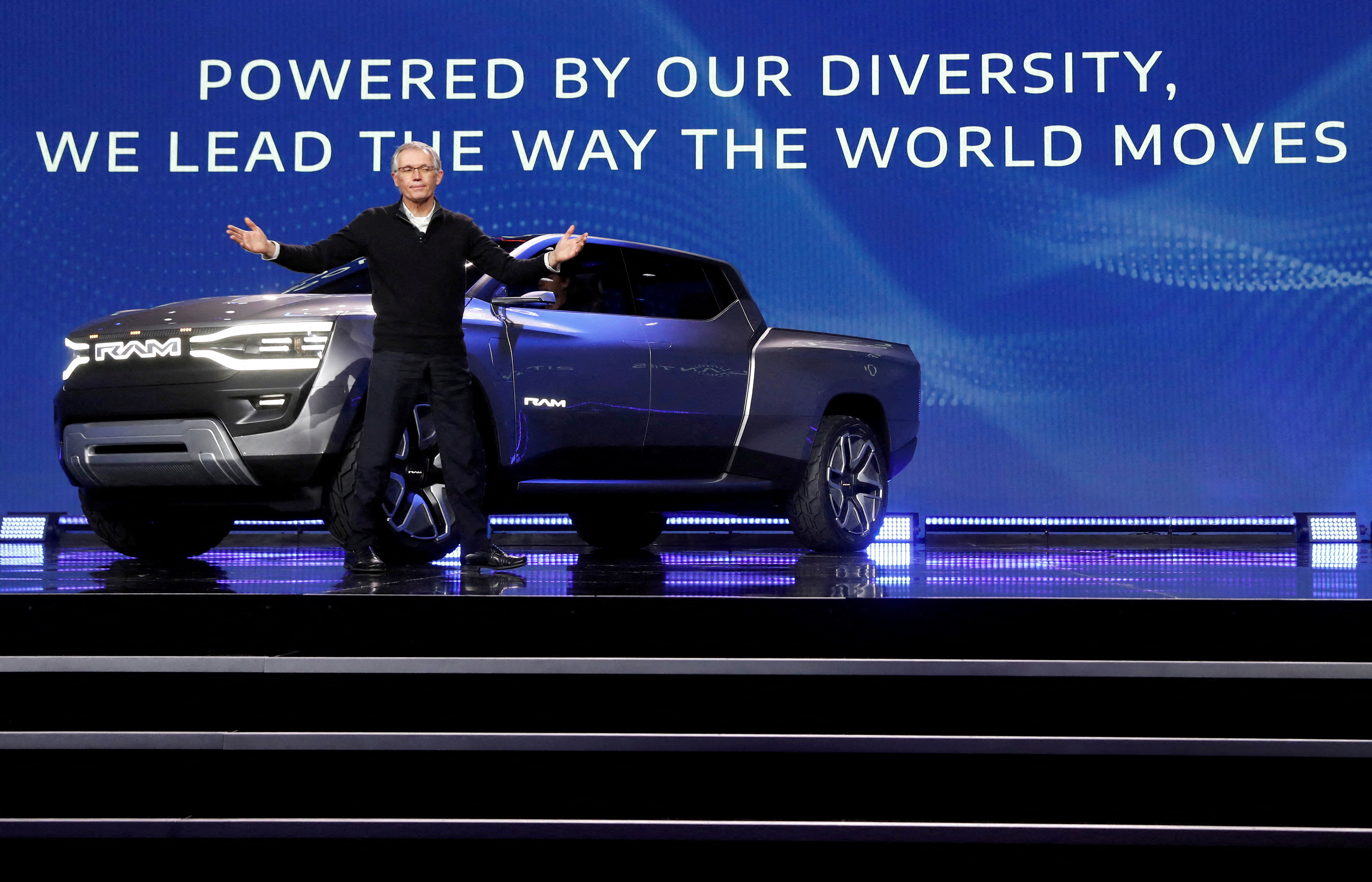 Stellantis CEO Carlos Tavares poses in front of the Ram 1500 Revolution electric concept pickup truck during a Stellantis keynote address at CES 2023, an annual consumer electronics trade show in Las Vegas