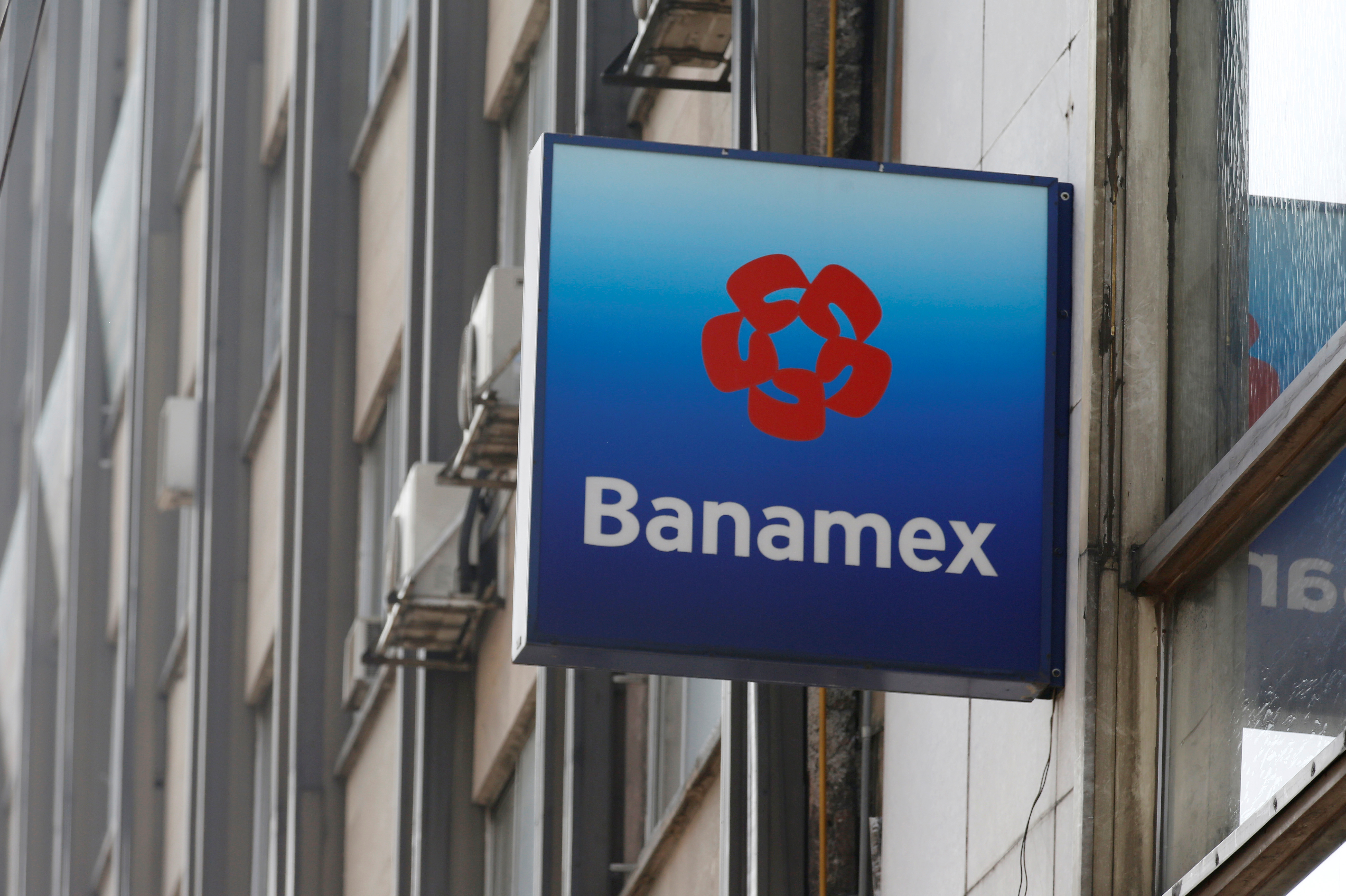 The logo of Banamex bank is on a branch in Mexico City