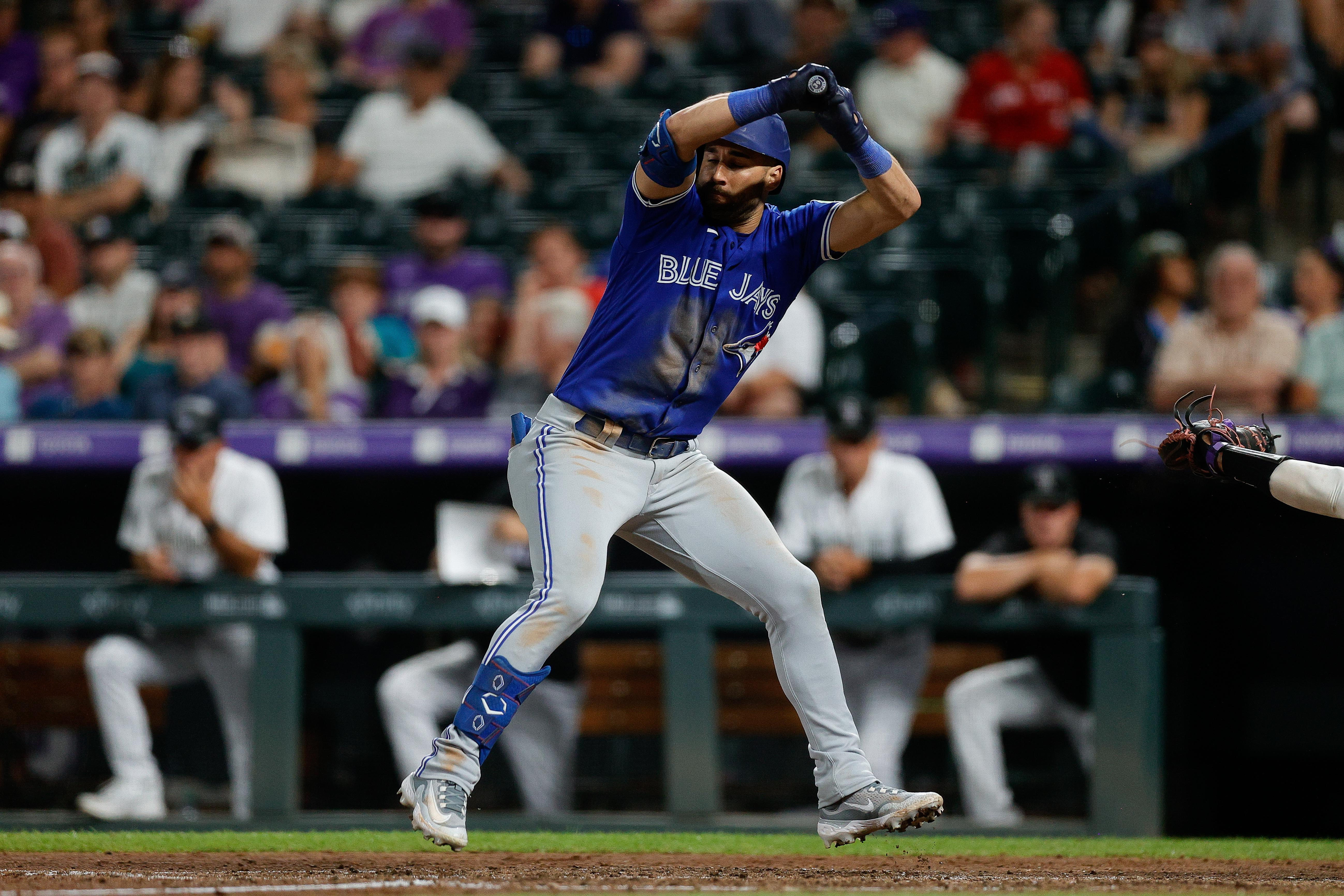 Jays score in each of final 6 innings of 13-9 over Rockies