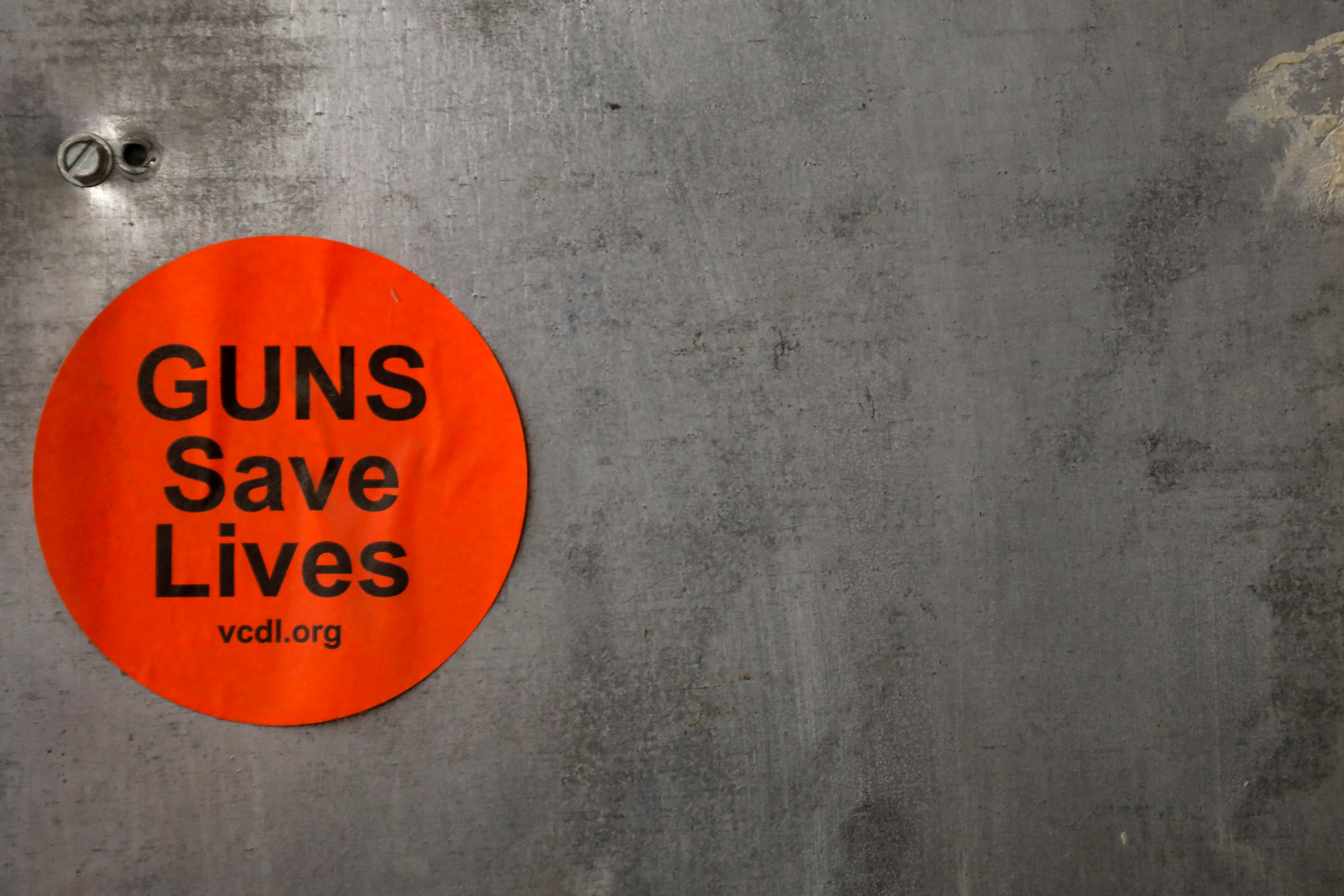 A sticker is seen on the wall of a shooting range where the Hudson Valley Nubian Gun Club practice in Monroe, New York