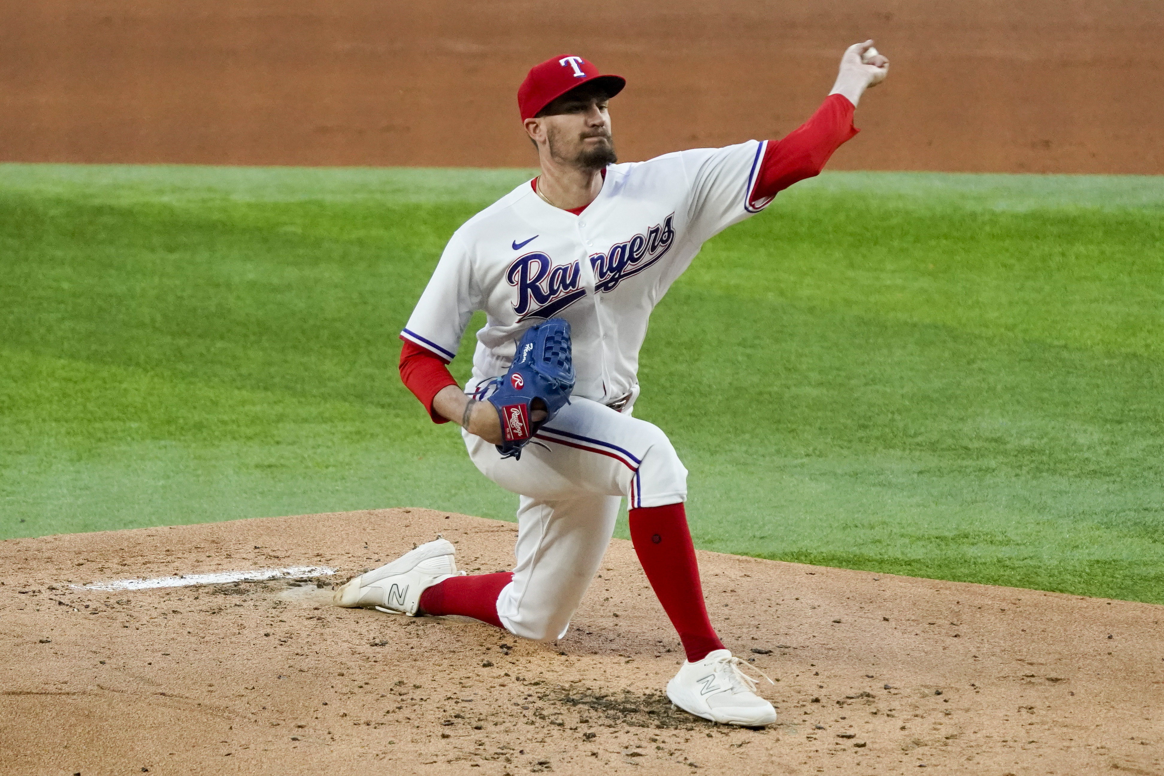 Andrew Heaney ties AL strikeout mark as Rangers rout Royals