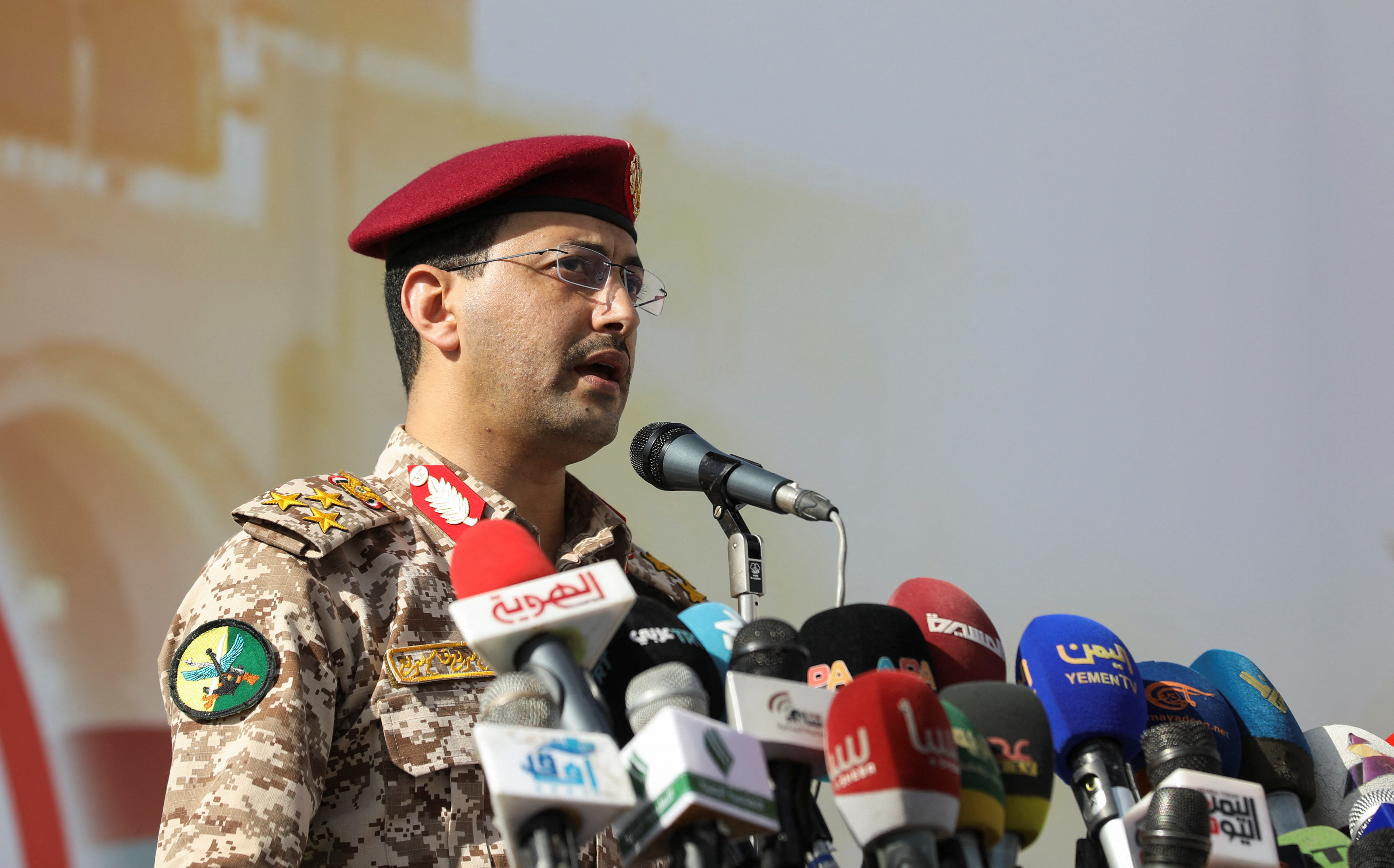 Houthi military spokesman, Yahya Sarea, delivers a statement during a pro-Palestinian rally in Sanaa