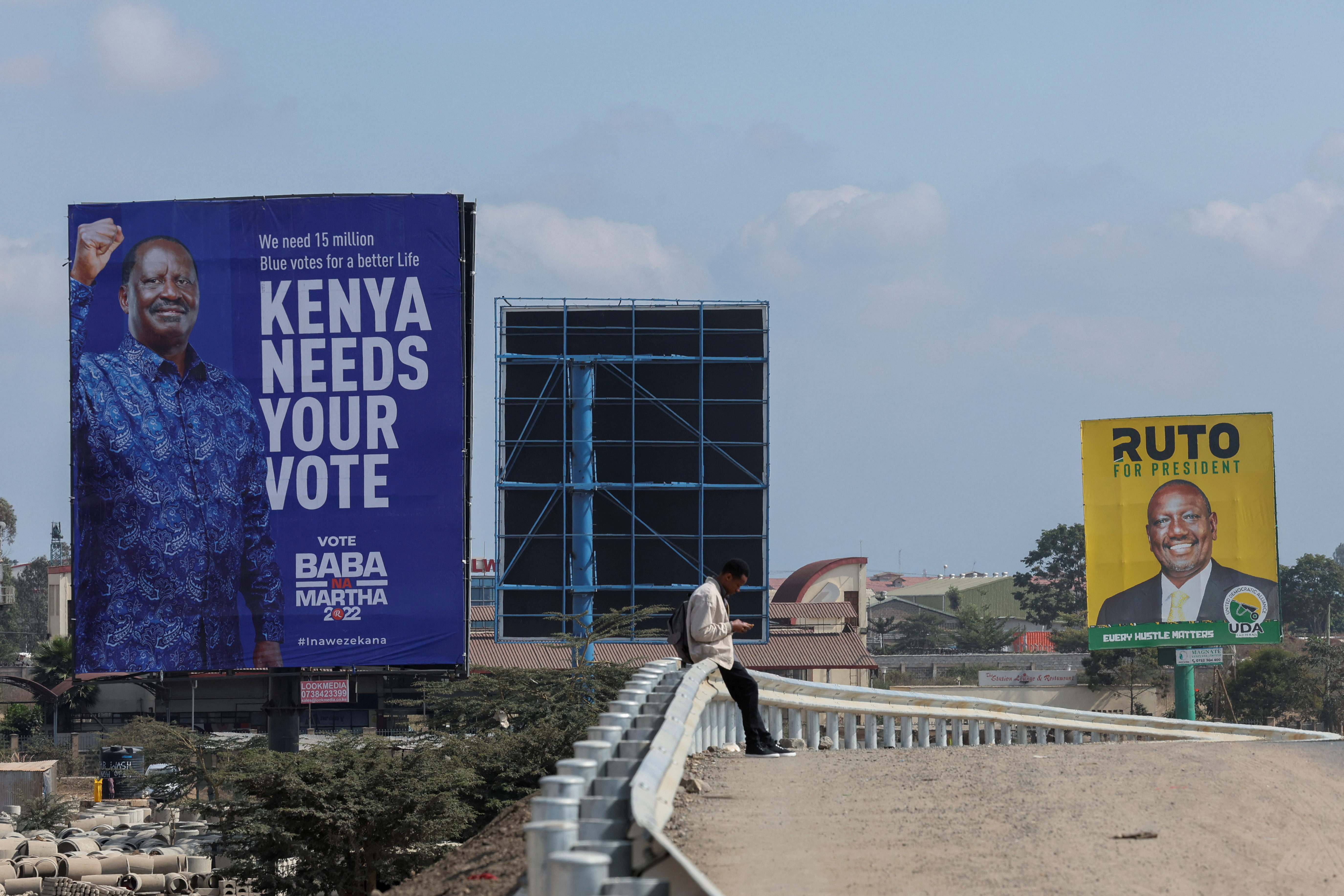 Election banners of Kenya's opposition leader and presidential candidate Raila Odinga and Kenya's Deputy President William Ruto, are seen in Nairobi