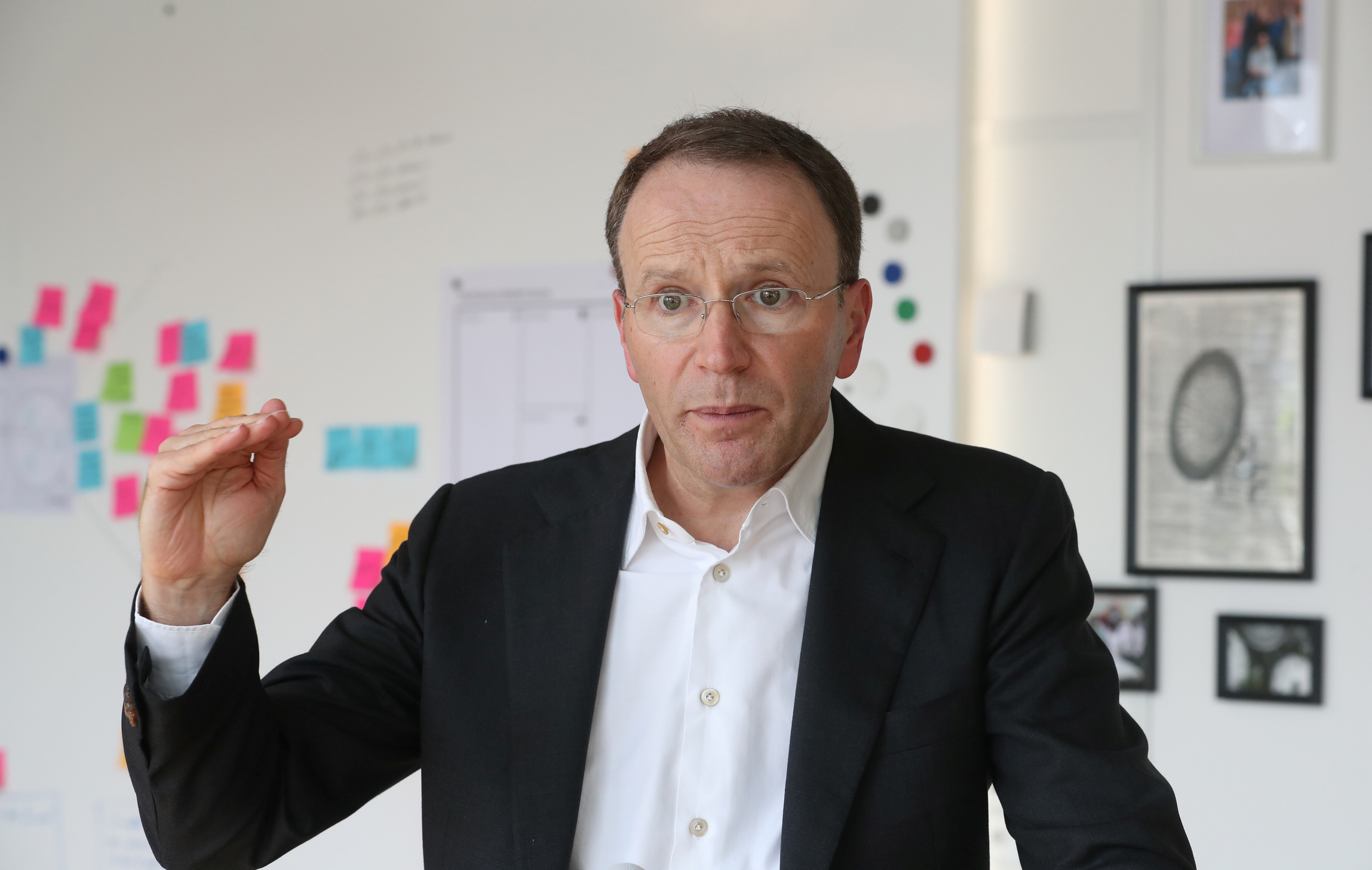 CEO Mark Schneider of Nestle gestures during an interview with Reuters in Konolfingen