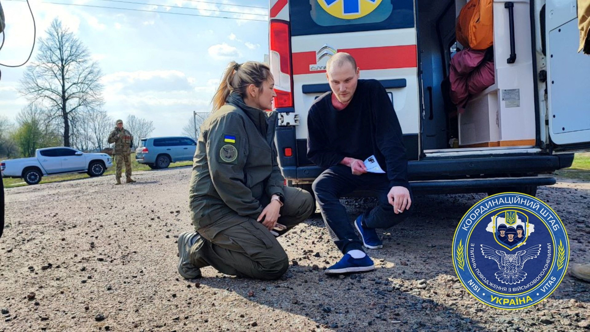 Ukrainian POWs are seen after swap in an unknown location in Ukraine