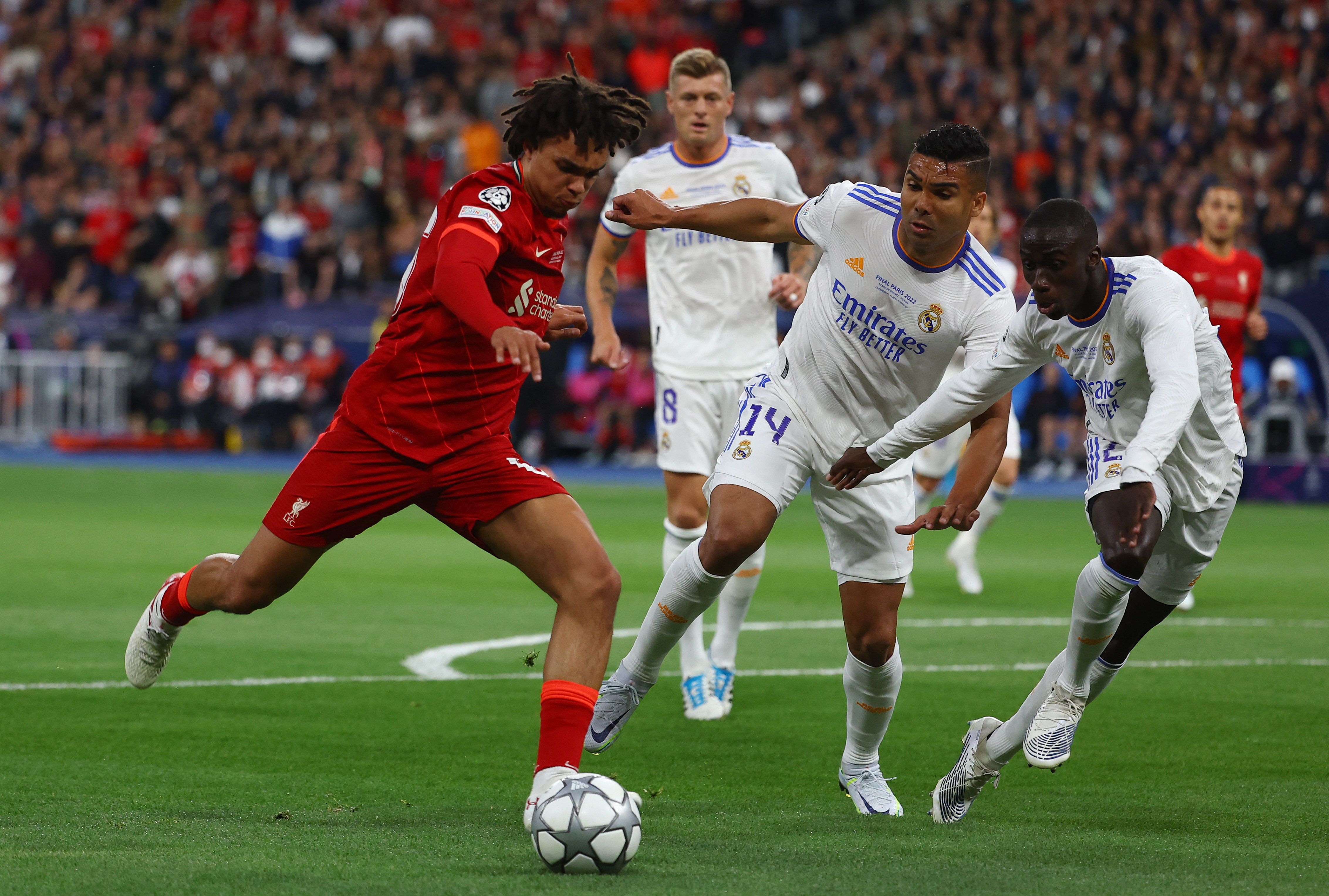 Liverpool's Andrew Robertson heads the ball during the Champions League  final soccer match between Liverpool and Real Madrid at the Stade de France  in Saint Denis near Paris, Saturday, May 28, 2022. (
