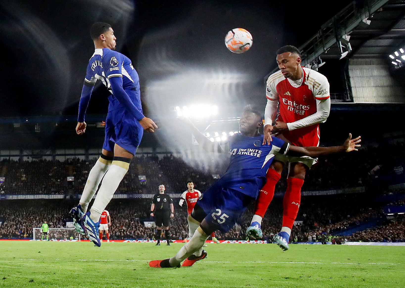 Arsenal fight back from two goals down to draw at Chelsea | Reuters