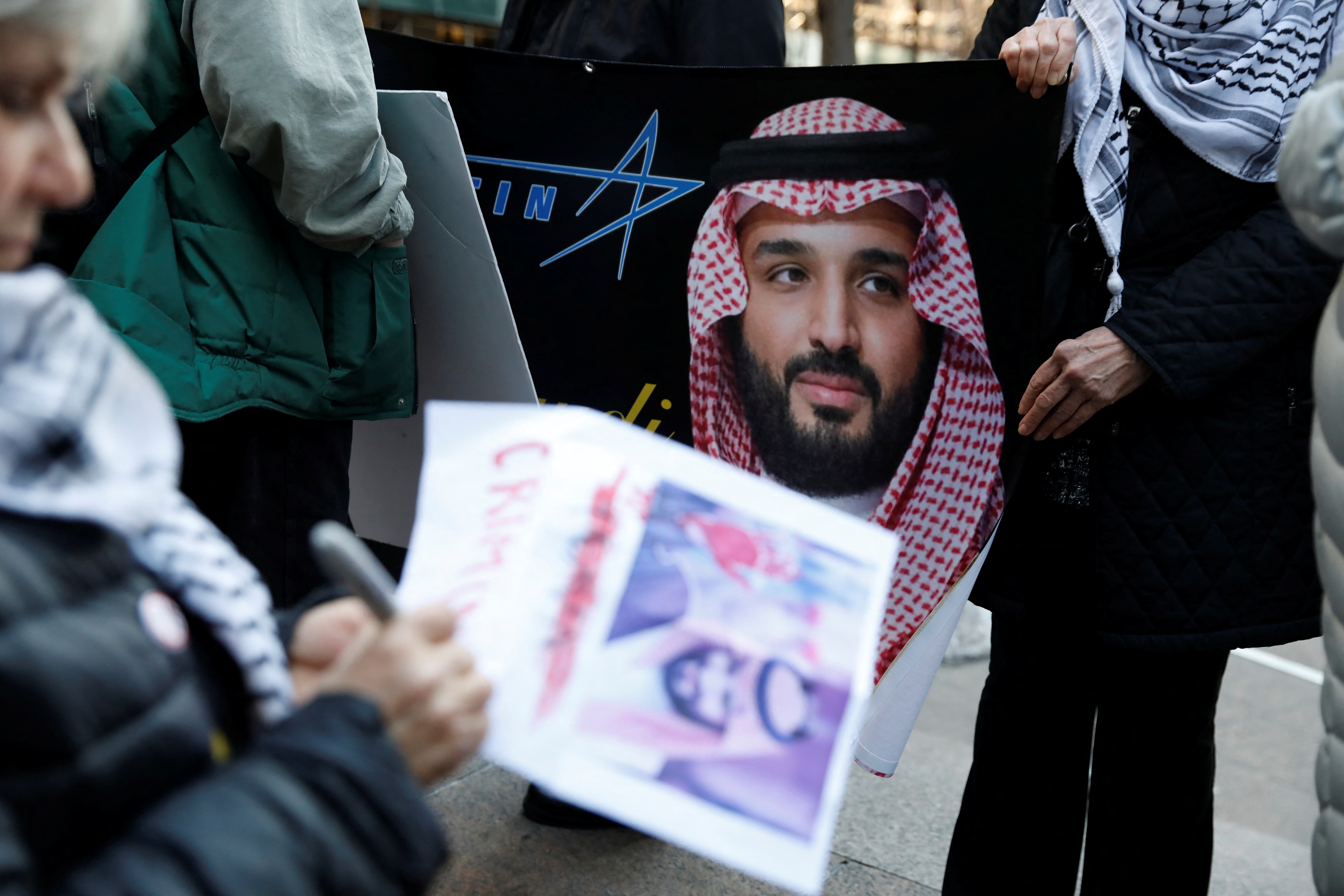 Demonstrators rally against the visit of Saudi Crown Prince Mohammed bin Salman with Wall Street executives in Manhattan
