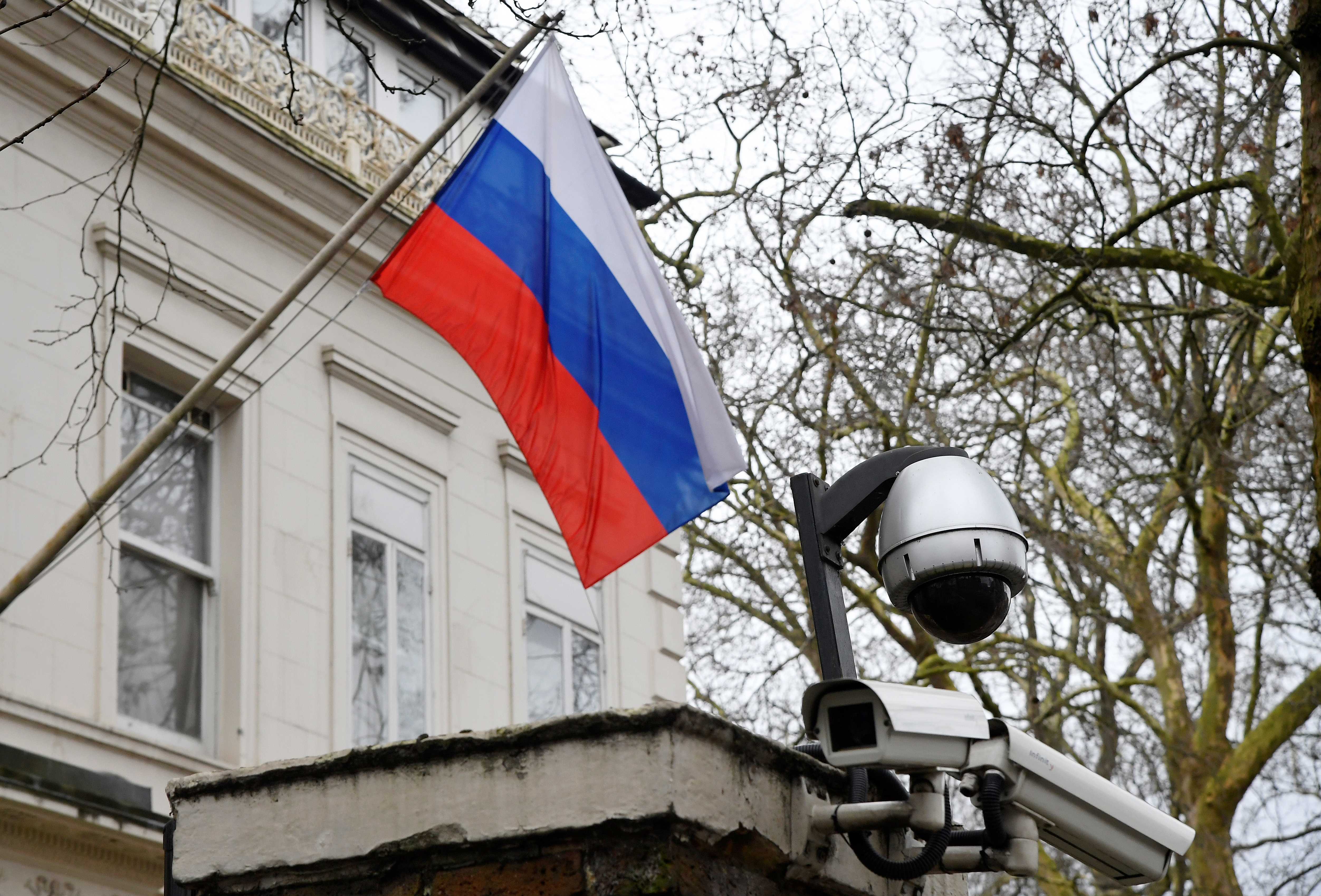 A flag flies outside the consular section of Russia's Embassy in London