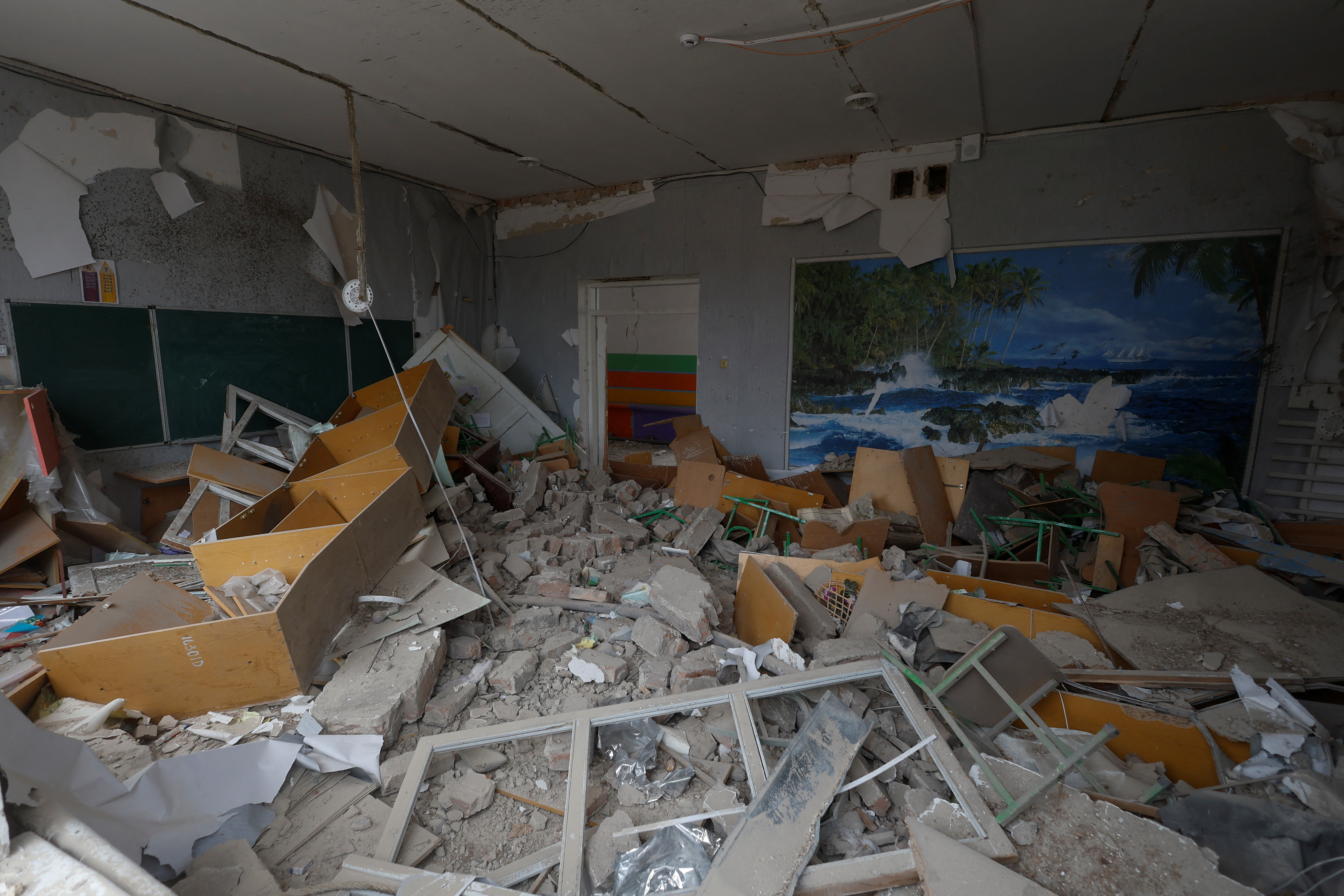 Interior view shows a classroom of a local school destroyed during a Russian missile attack in the village of Novooleksandrivka, in Kherson region