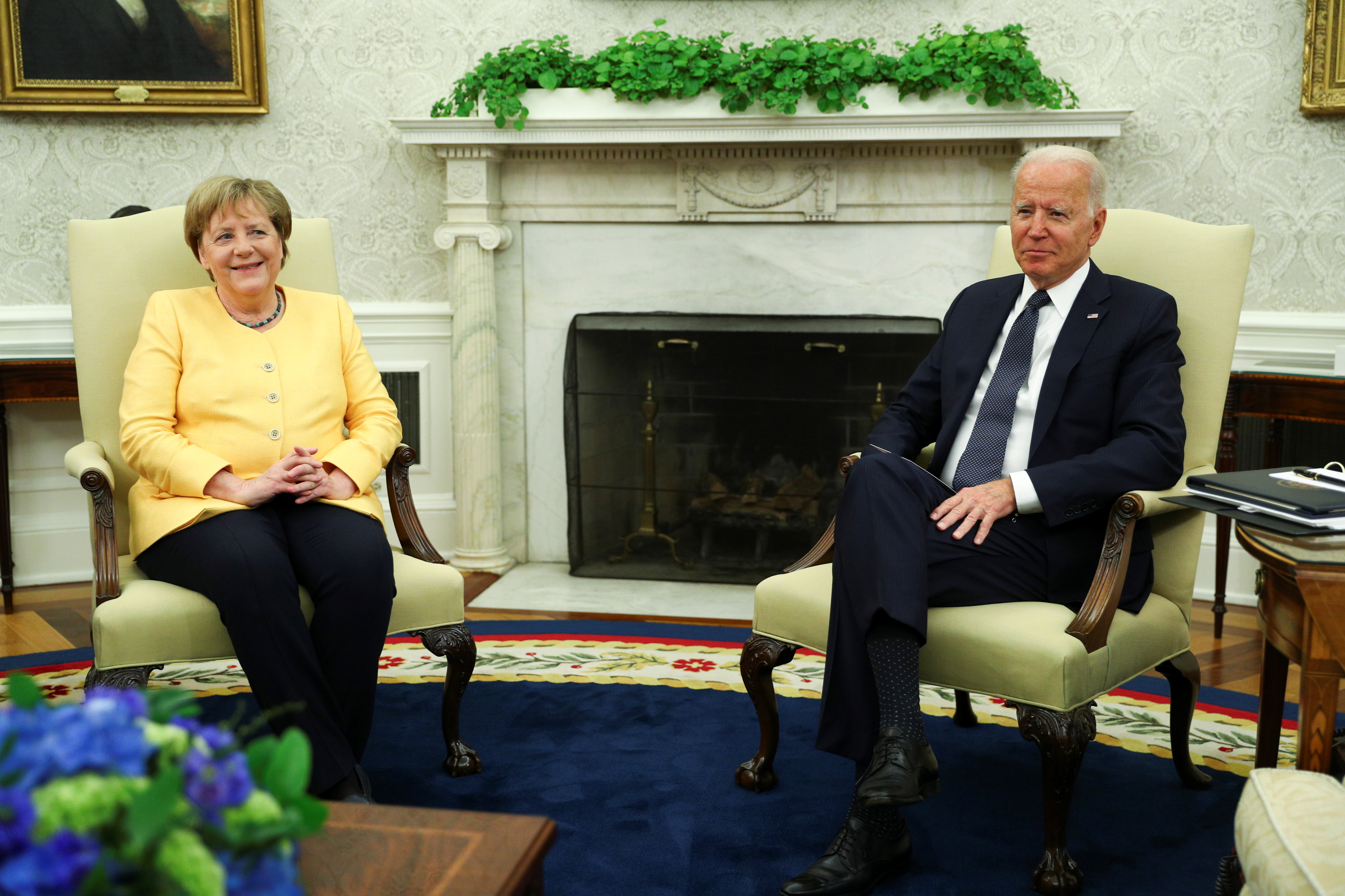 U.S. President Joe Biden holds a bilateral meeting with German Chancellor Angela Merkel in the Oval Office at the White House