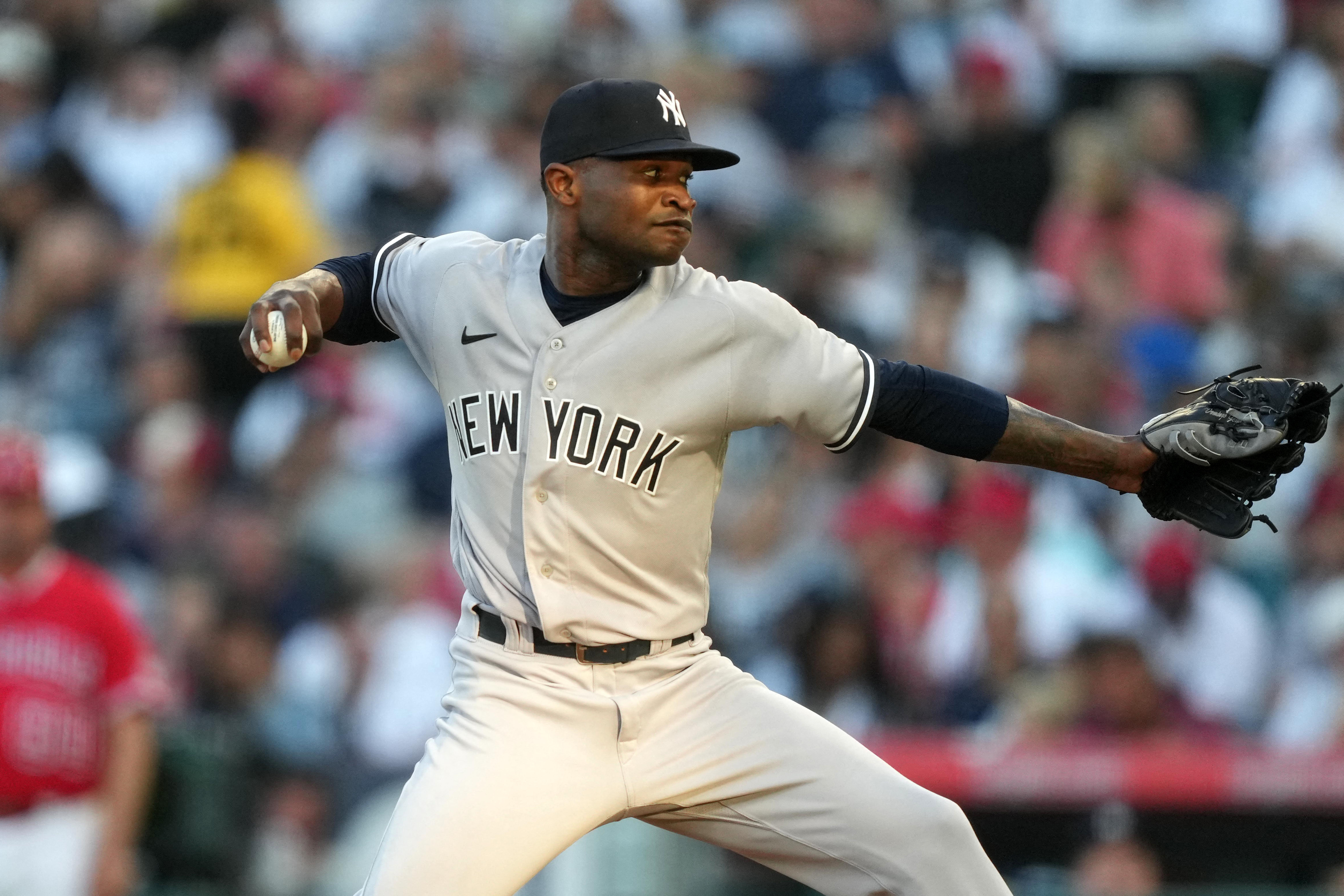 ANAHEIM, CA - JULY 18: New York Yankees pitcher Domingo German (0) pitching  during an MLB baseball game against the Los Angeles Angels played on July  18, 2023 at Angel Stadium in