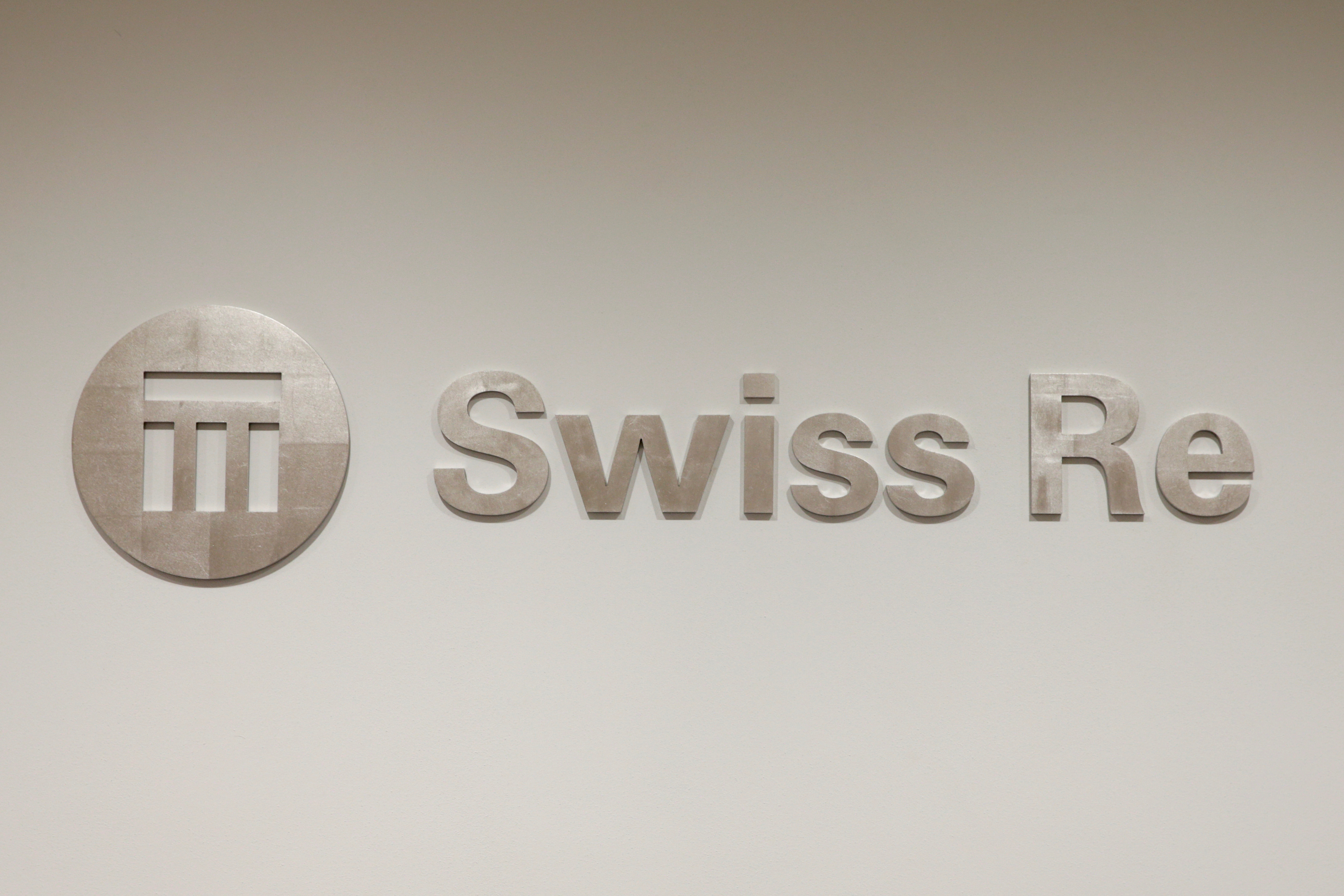 The logo of the world's second largest reinsurer Swiss Re is seen inside the company's offices in Zurich