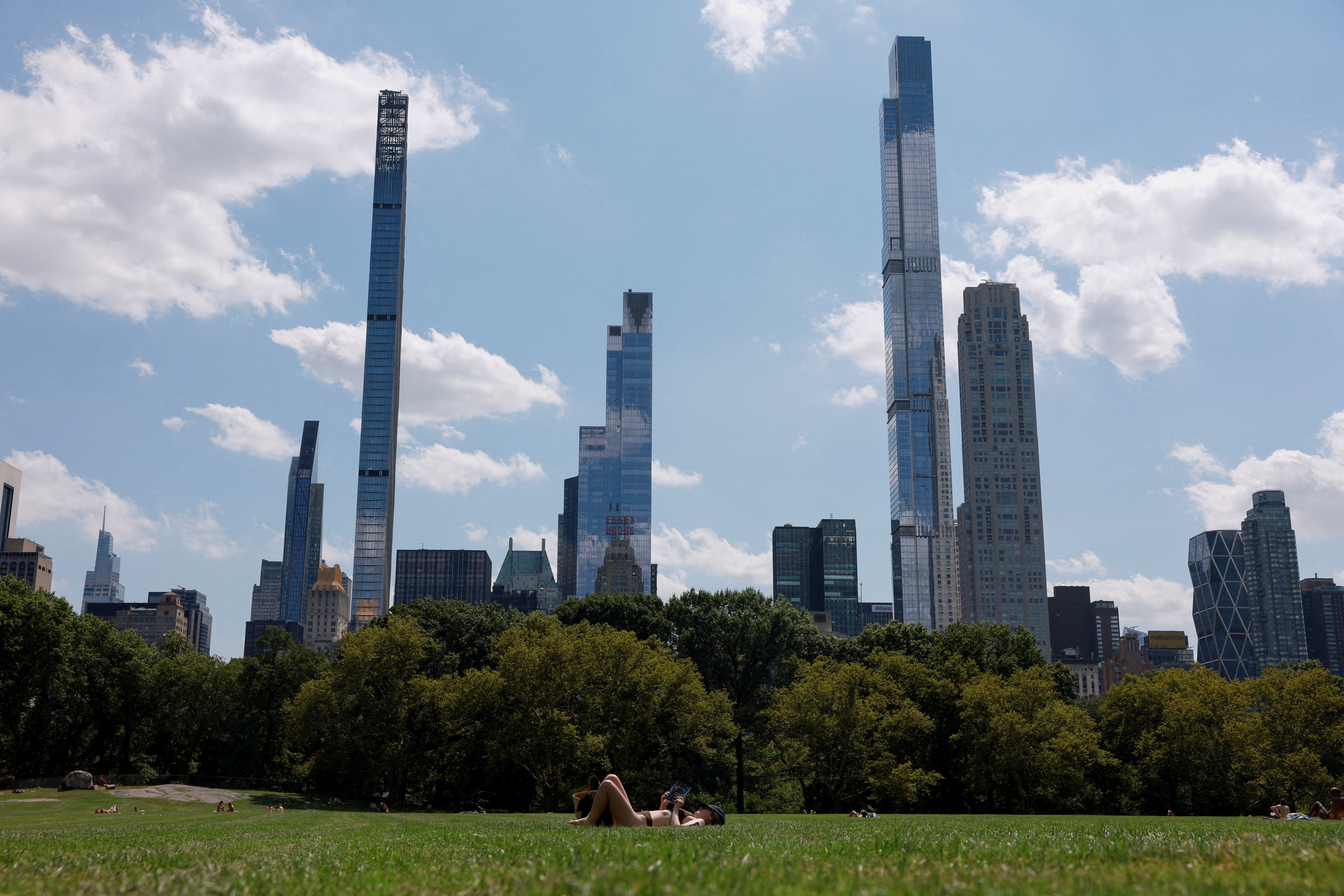 People brave a summer heat wave in New York City