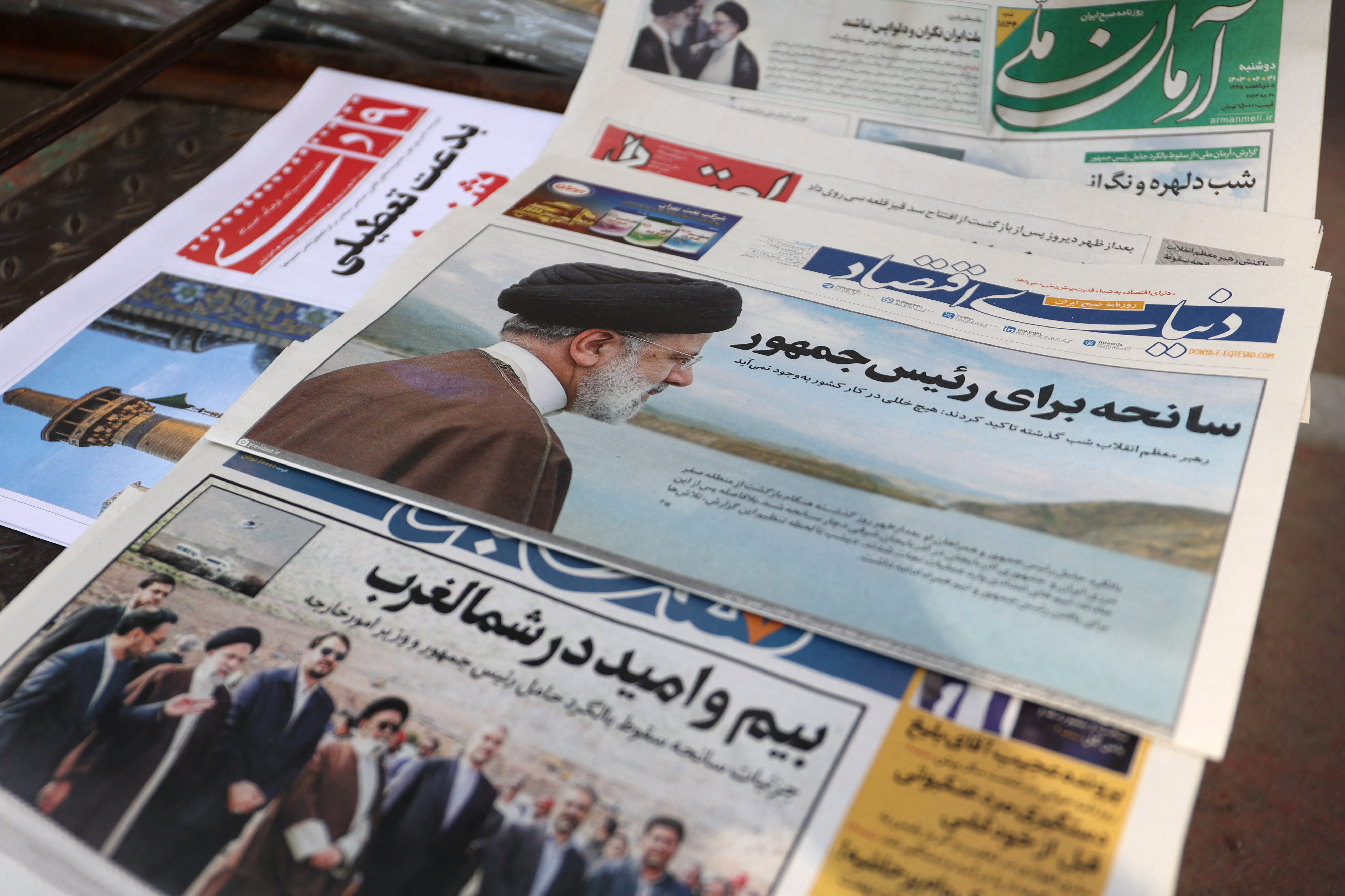 A newspaper with a picture of the late Iran's President Ebrahim Raisi is seen in Tehran