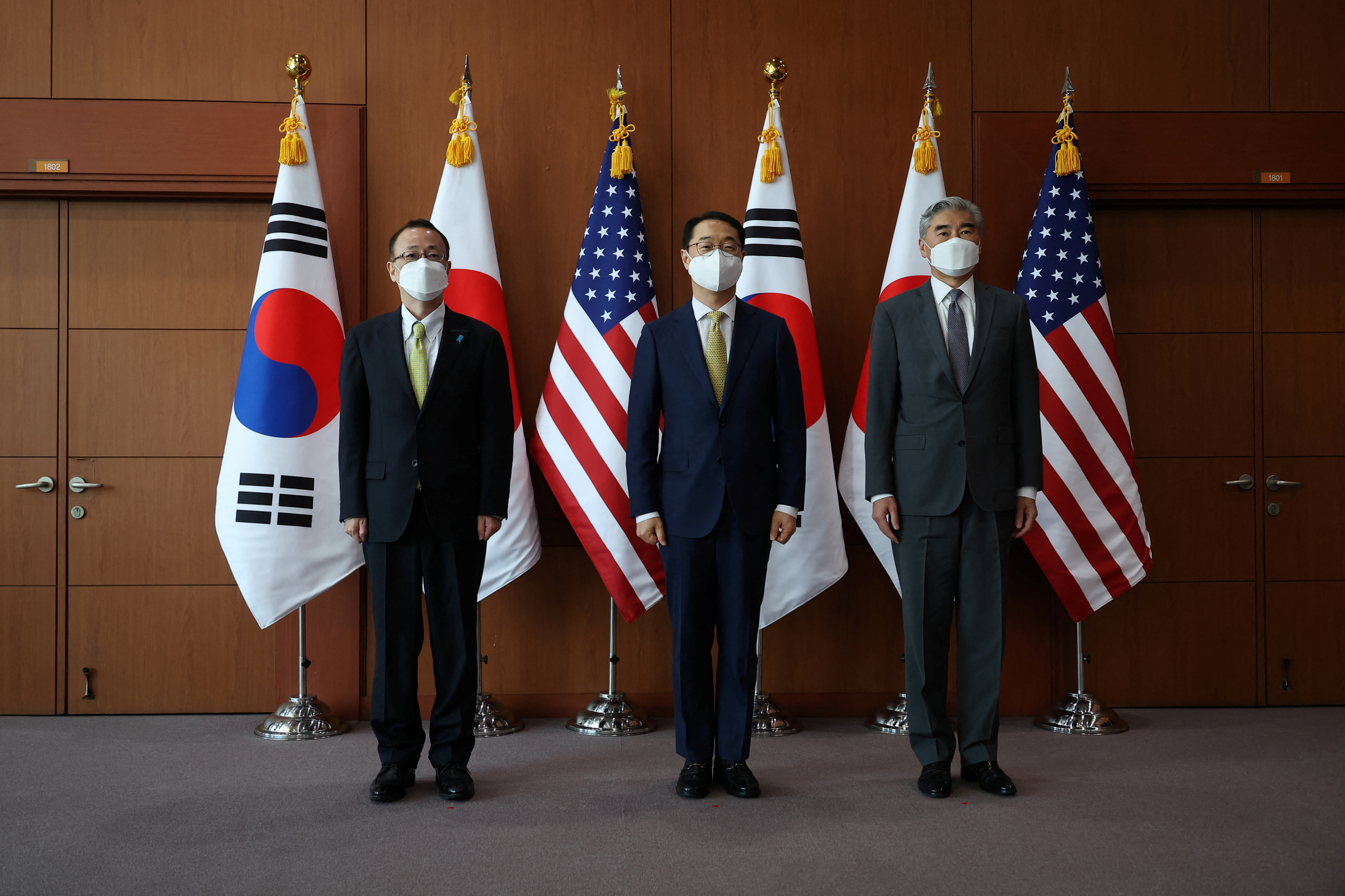 Kim Gunn, South Korea's new special representative for Korean Peninsula peace and security affairs, his U.S. counterpart Sung Kim and Japanese counterpart Takehiro Funakoshi arrive for their meeting at the Foreign Ministry in Seoul