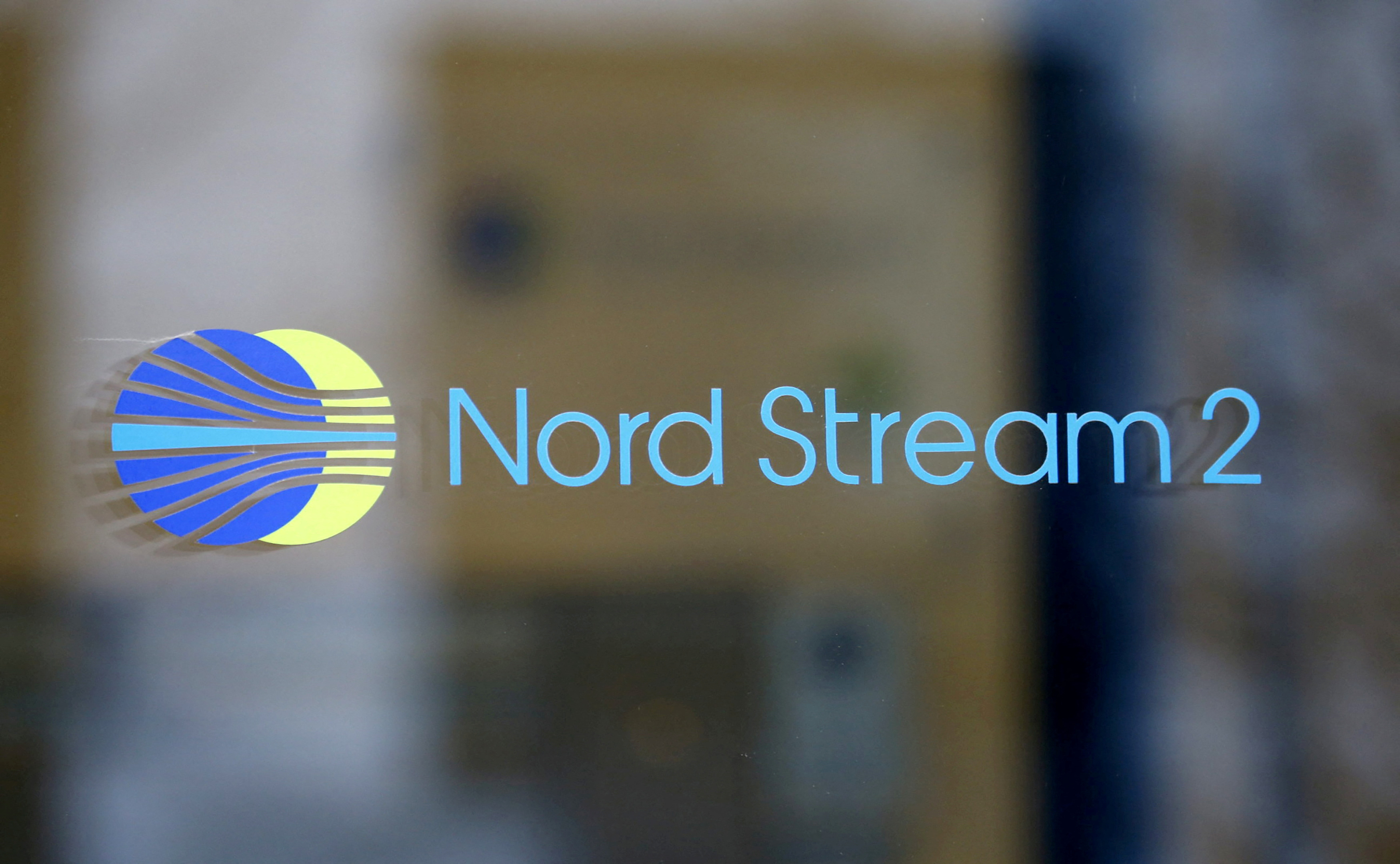 The logo of Nord Stream 2 AG is seen at an office building in Zug