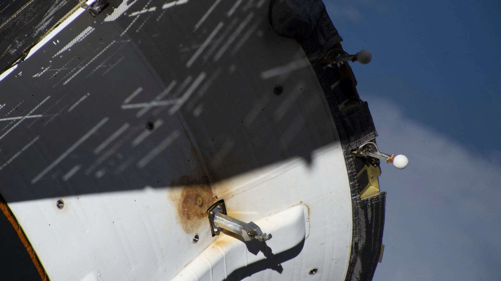 A view shows external damage believed to have caused a loss of pressure in the cooling system of the Soyuz MS-22 spacecraft