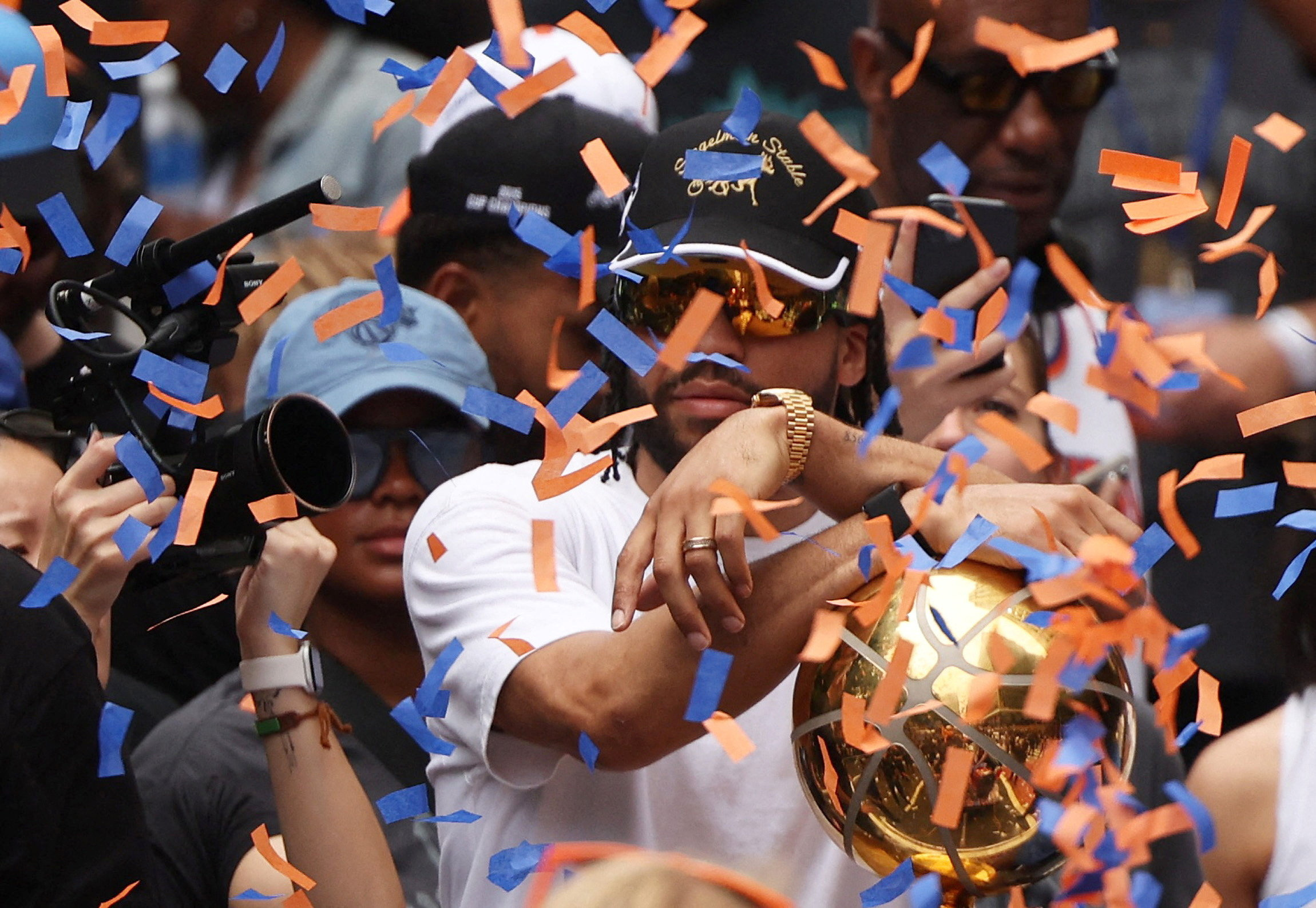 Euphoric Knicks fans flood New York for NBA championship ticker-tape parade | Reuters