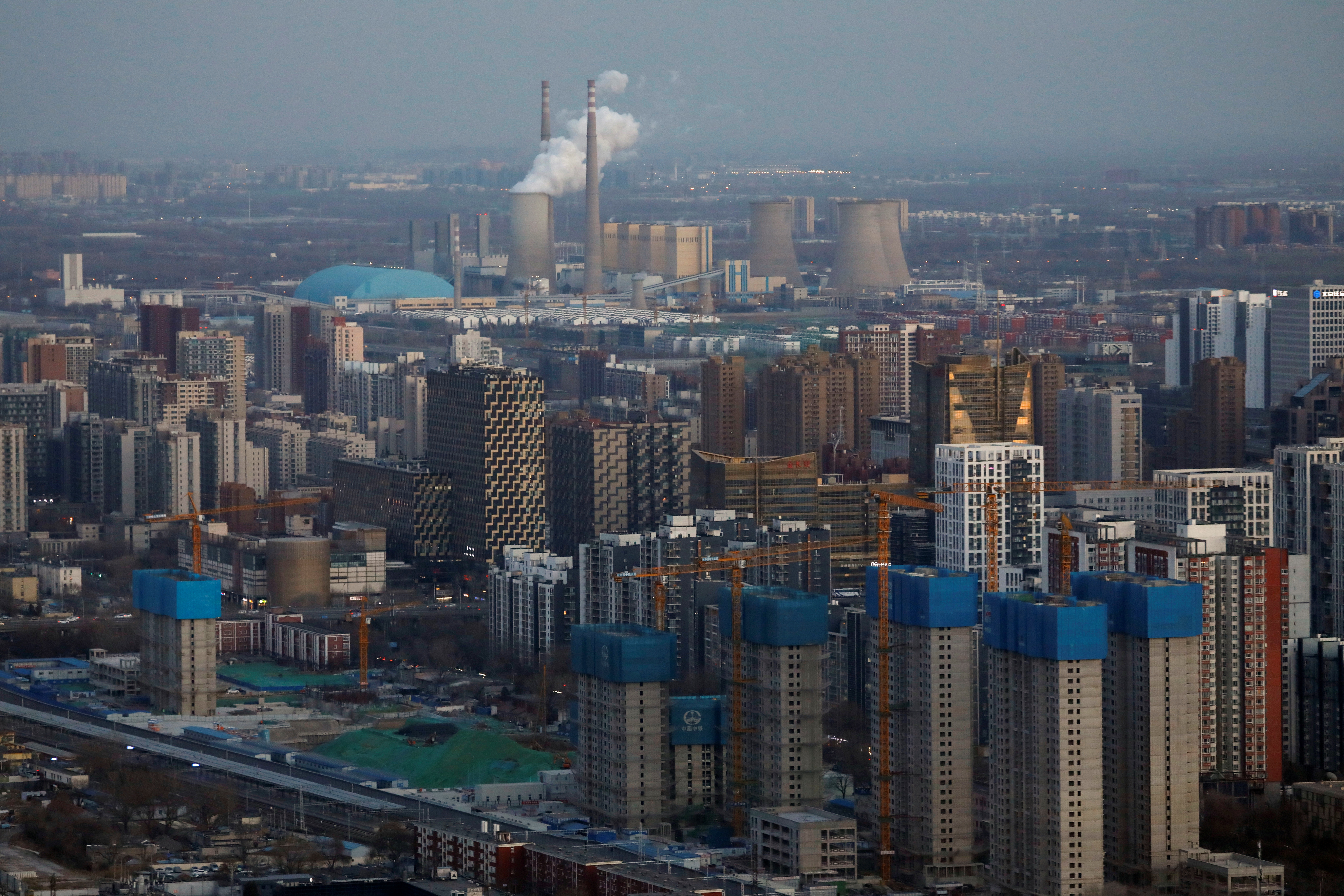 Residential buildings under construction are seen near the central business district (CBD) in Beijing