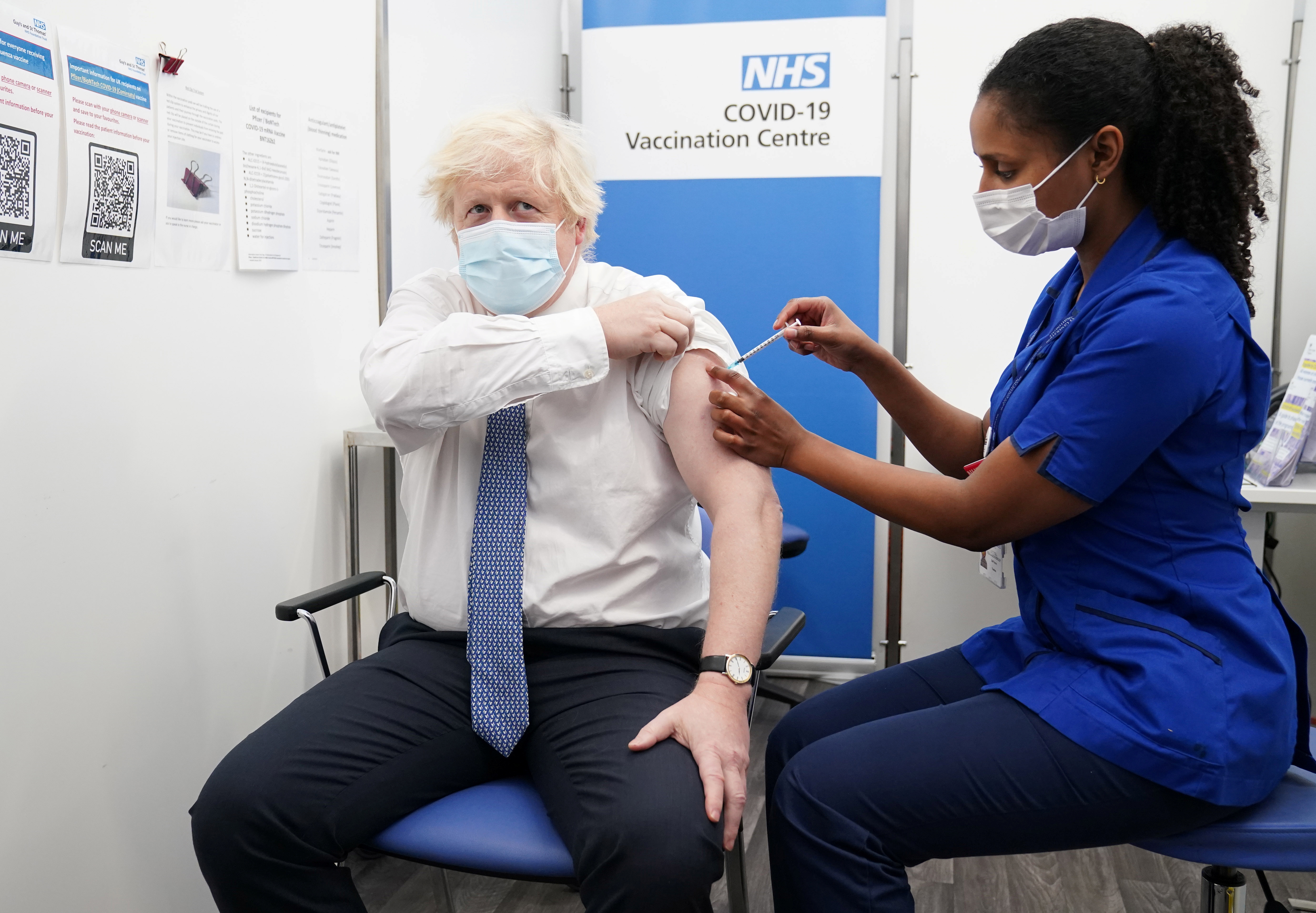 Britain's Prime Minister Boris Johnson receives his coronavirus booster vaccination at St Thomas Hospital in London, Britain December 2, 2021. Paul Edwards/Pool via REUTERS