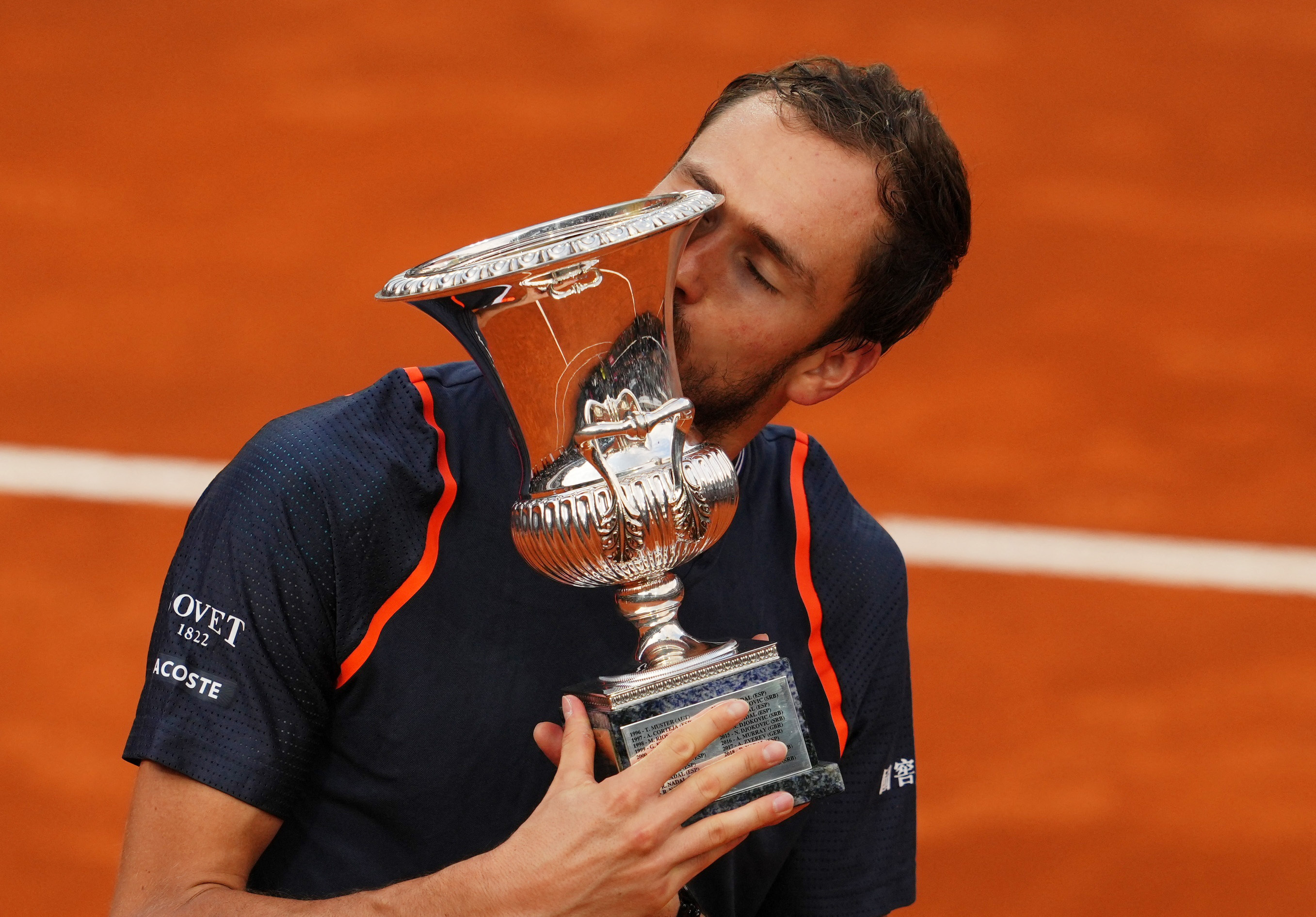 Holger Rune beats Novak Djokovic in rainy Italian Open