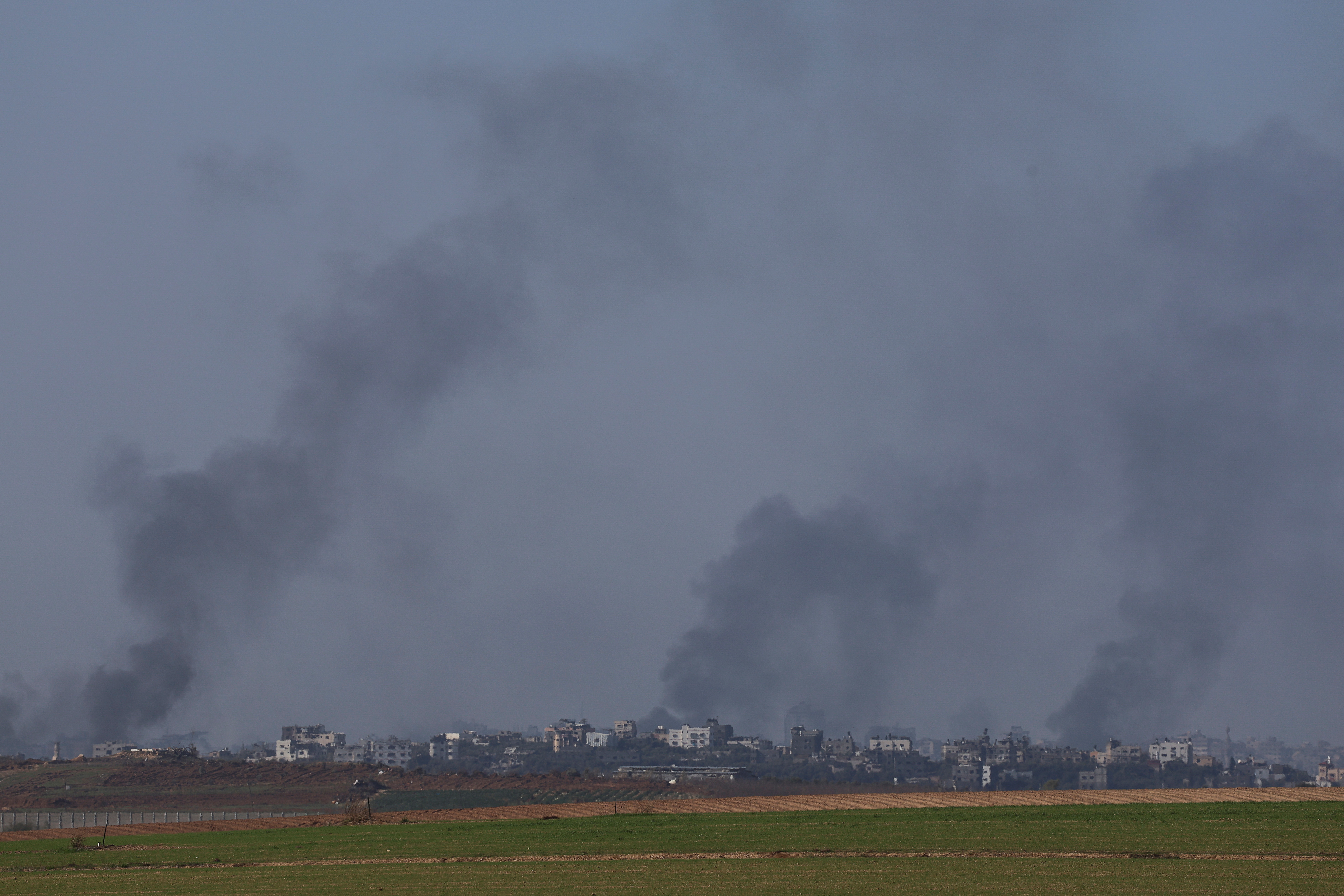 Smoke rises over Gaza as seen from southern Israel