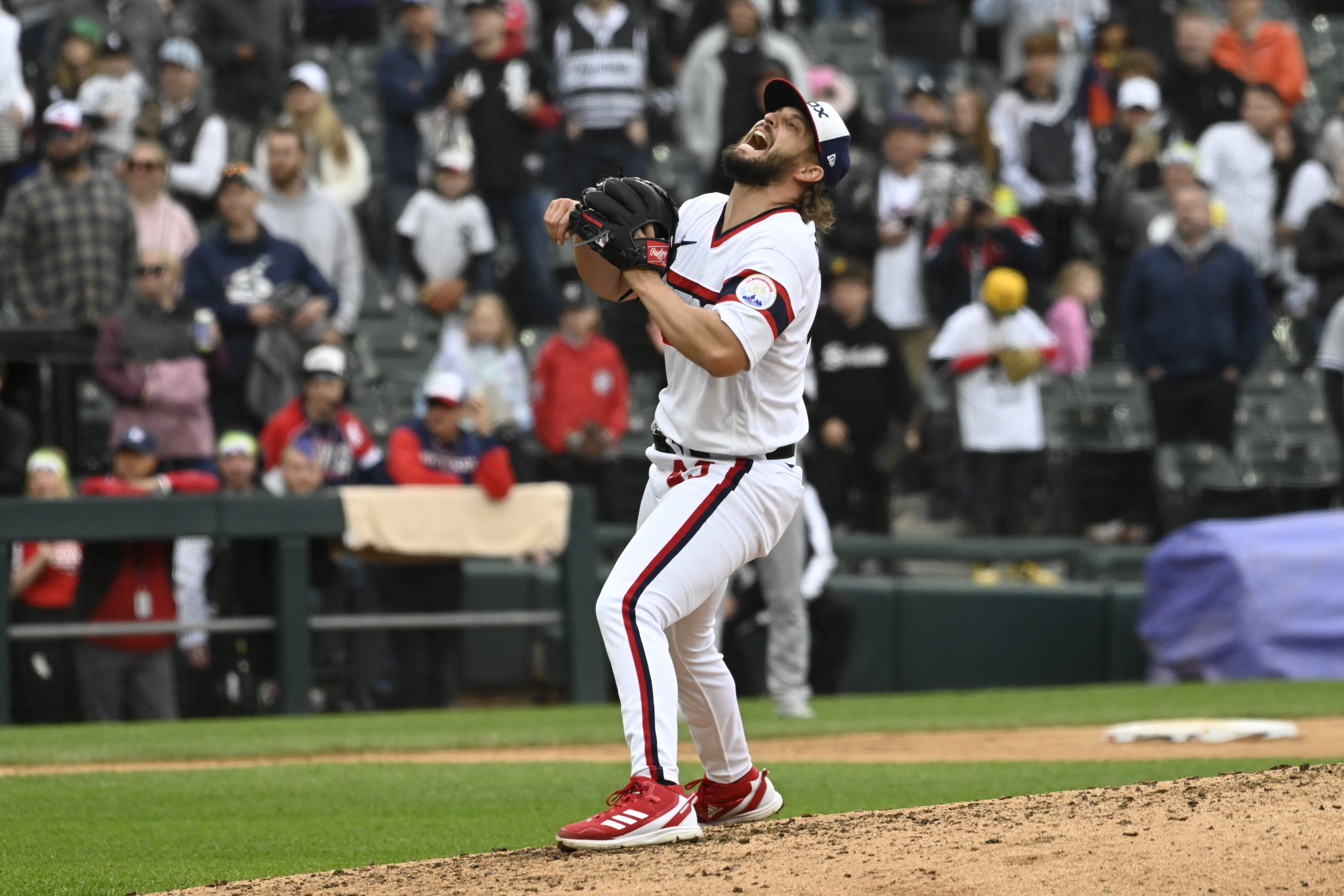 Marlins storm back with three-run ninth to topple White Sox