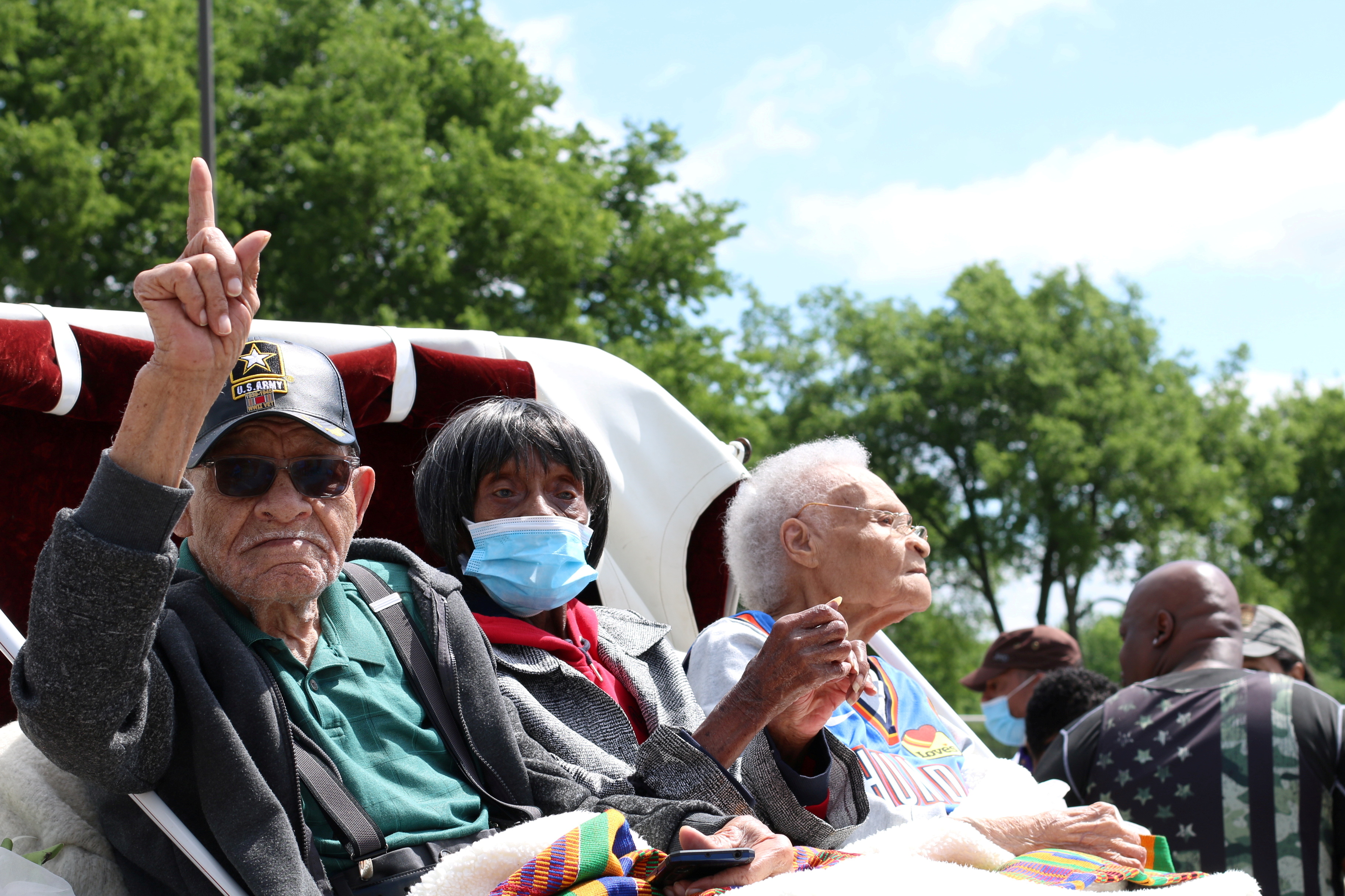 Hughes Van Ellis, 100, Lessie Benningfield Randle, 106, also known as Mother Randle, and Viola Fletcher, 107, the oldest living survivor of the Tulsa Race Massacre and older sister of Van Ellis, attend the Black Wall Street Legacy Festival 2021 in Tulsa, Oklahoma, U.S., May 28, 2021. REUTERS/Polly Irungu