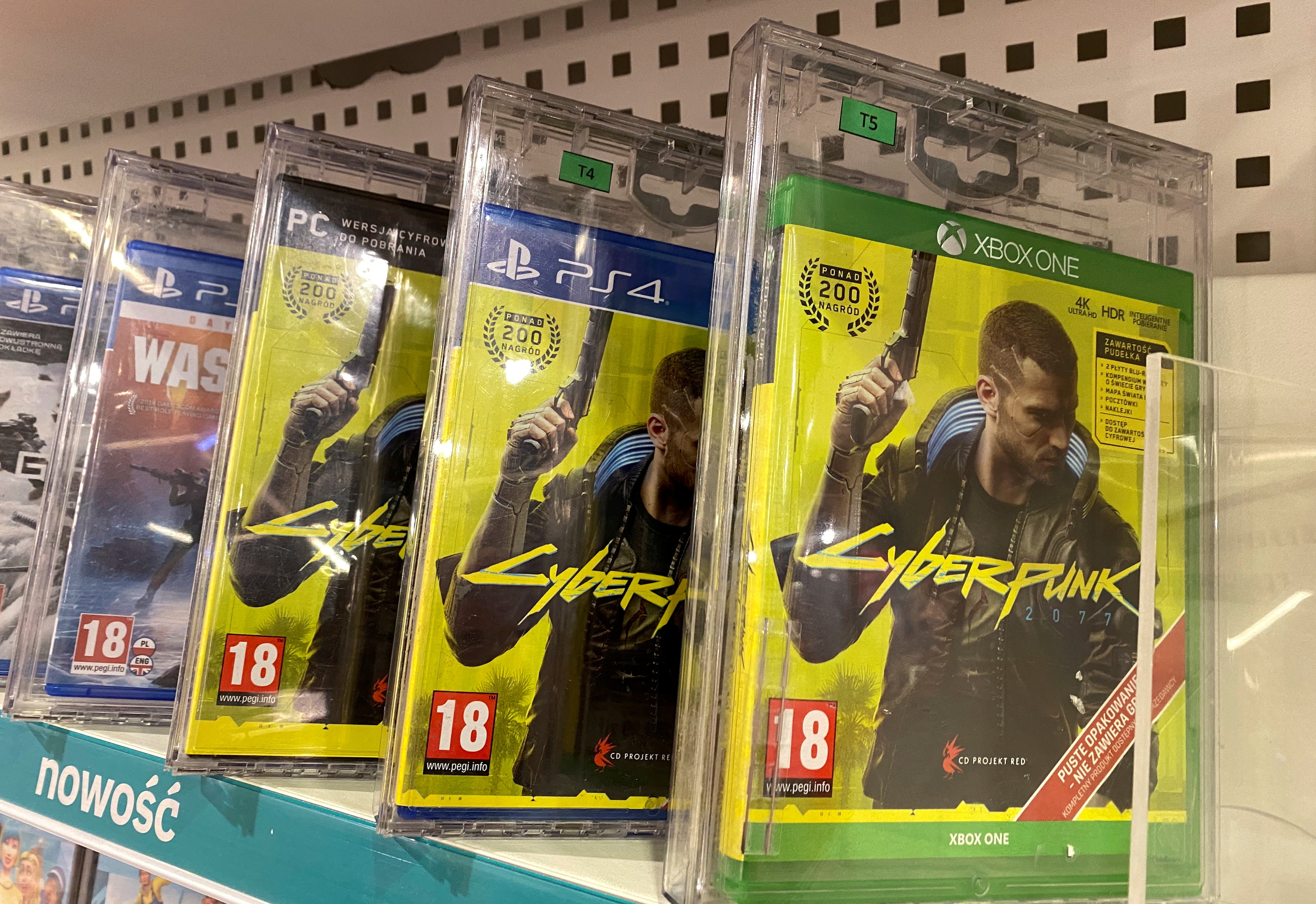 Boxes with CD Projekt's game Cyberpunk 2077 are displayed in Warsaw