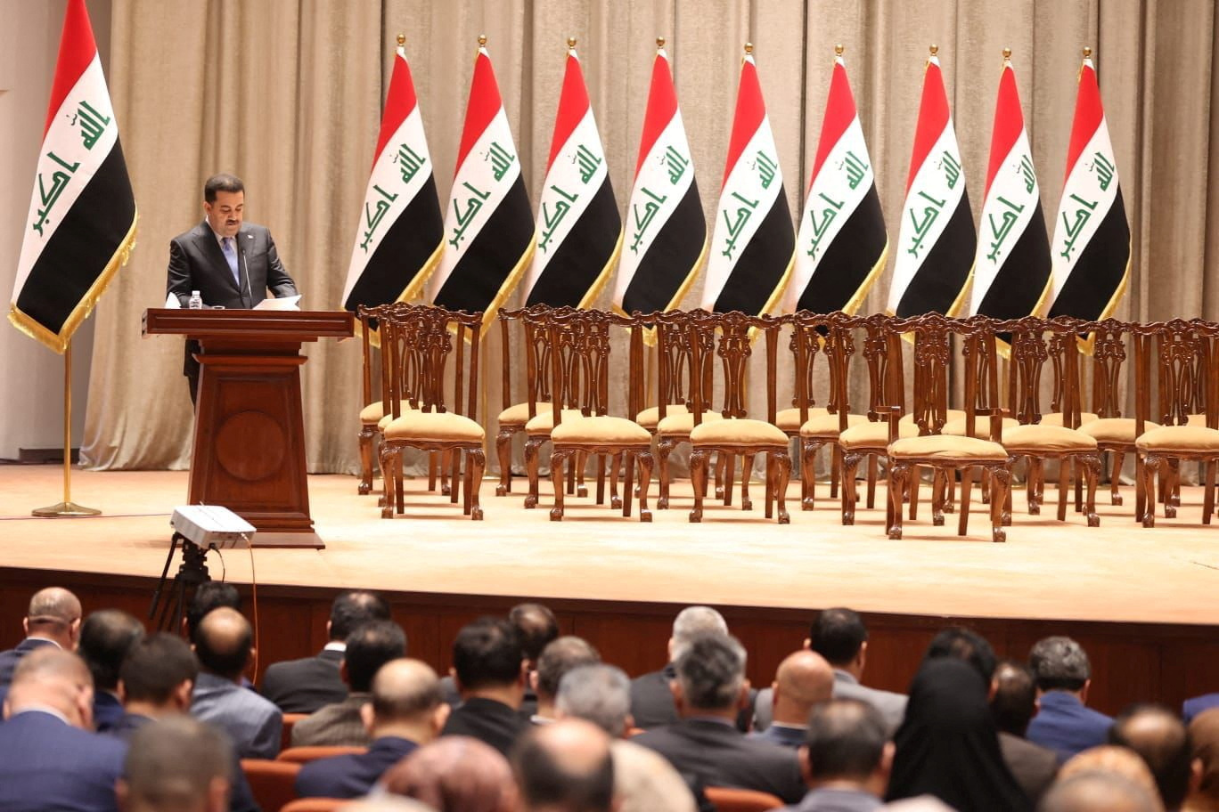 Iraqi Prime Minister-designate Mohammed Shia al-Sudani speaks during a vote in Sudani's cabinet at the parliament in Baghdad