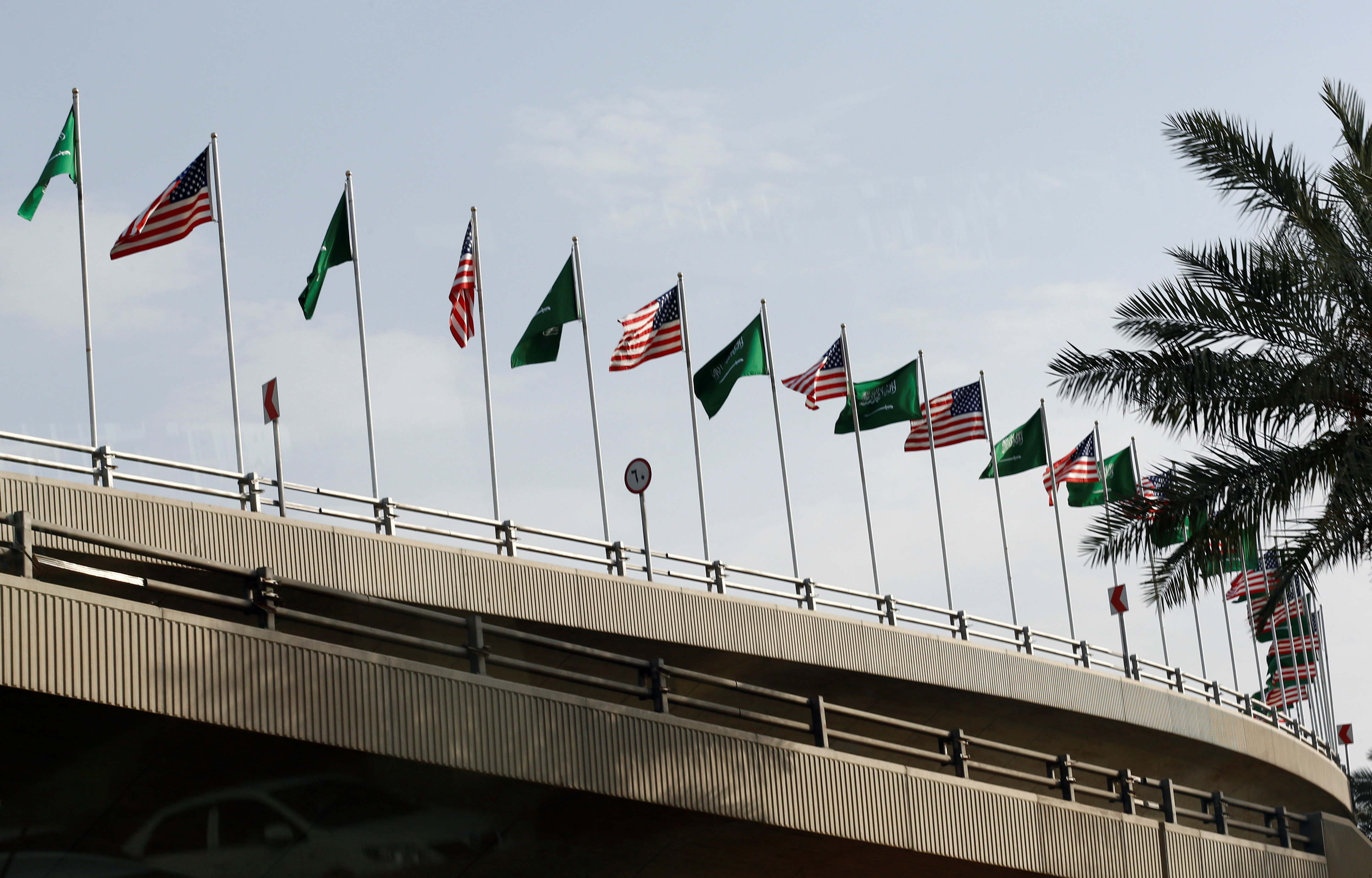 United States' and Saudi Arabia's flags are seen on Mecca Road as part of celebrations to welcome United States President Donald Trump, in Riyadh