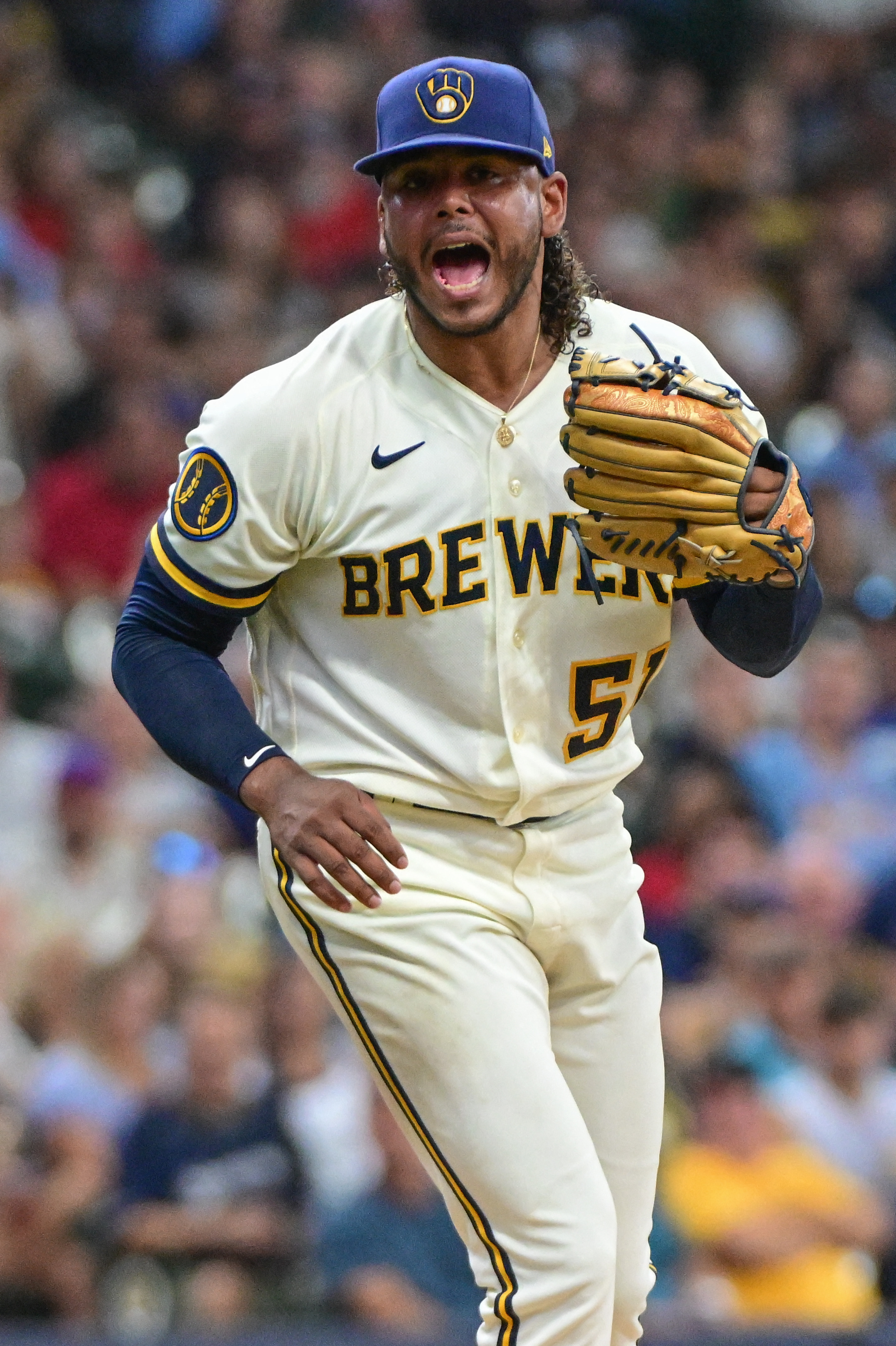 MILWAUKEE, WI - JULY 26: Milwaukee Brewers starting pitcher Freddy Peralta  (51) delivers a pitch during an MLB game against the Cincinnati Reds on  July 26, 2023 at American Family Field in